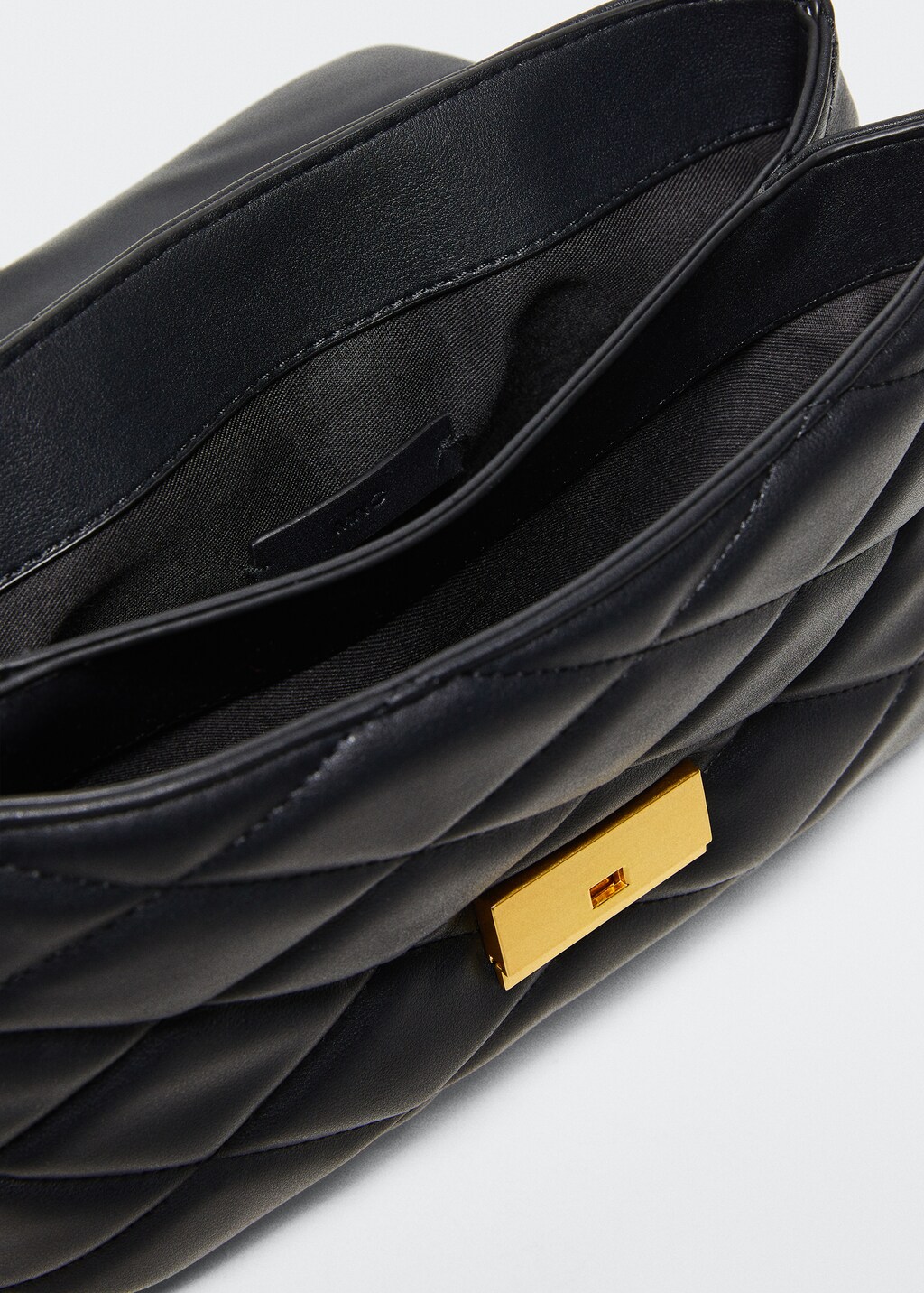 Quilted chain bag - Women | MANGO China