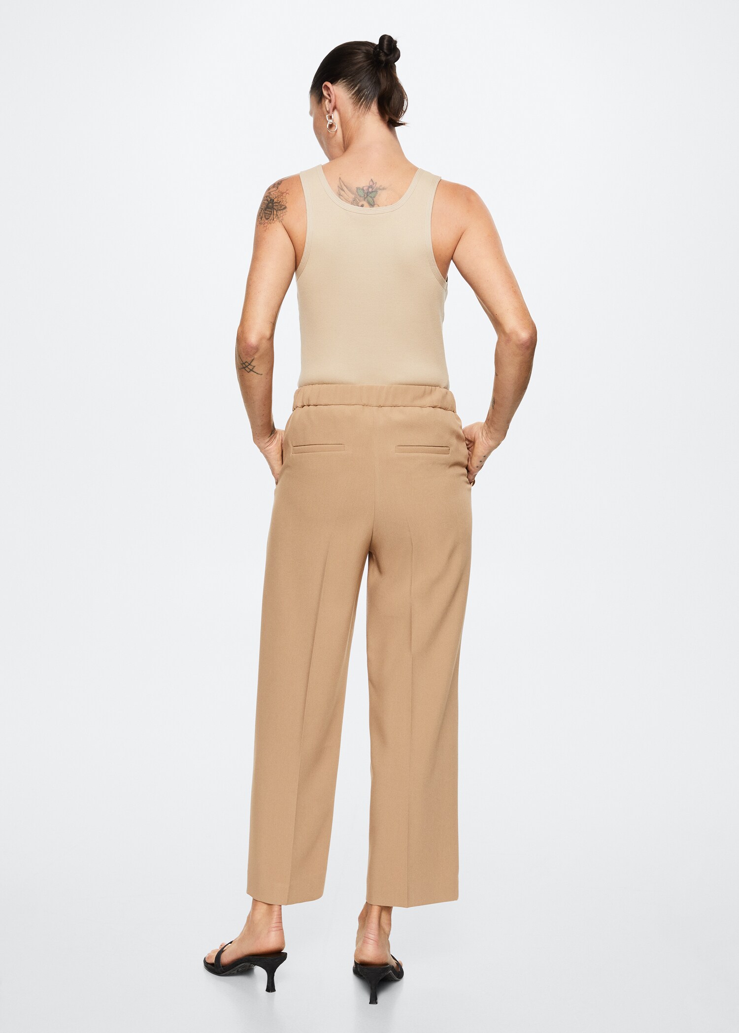 Cropped button trousers - Reverse of the article
