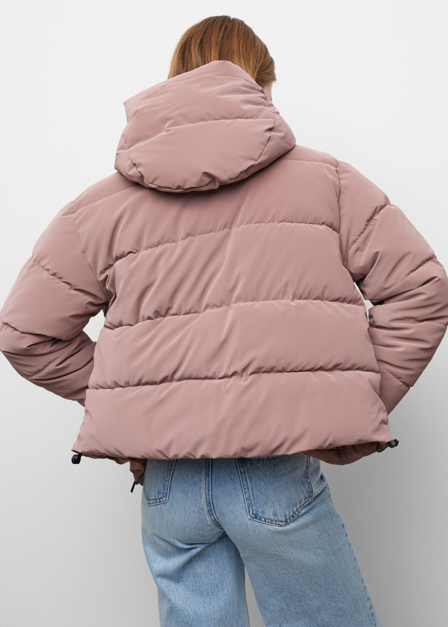 Side-zip quilted coat - Reverse of the article