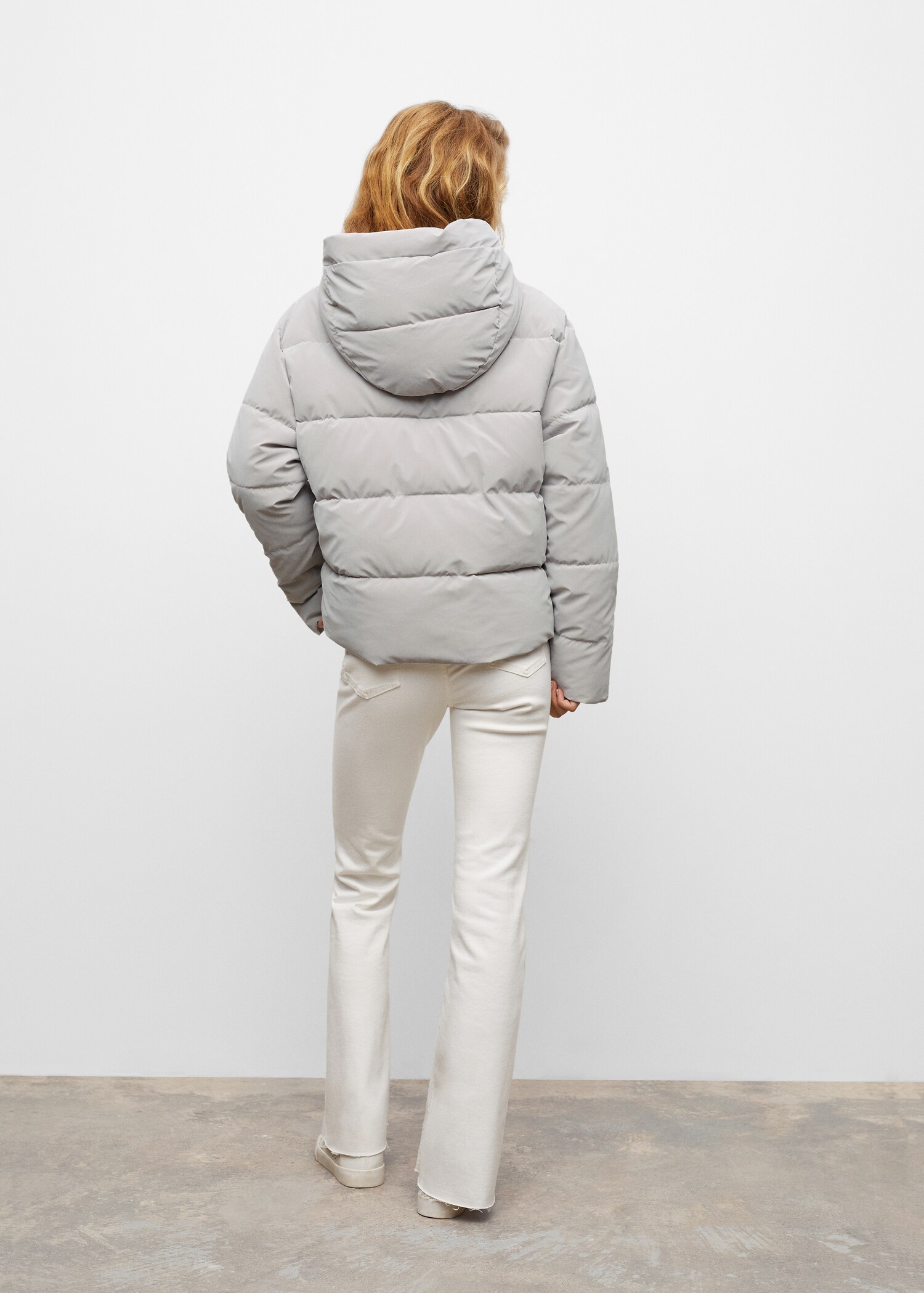 Side-zip quilted coat - Reverse of the article