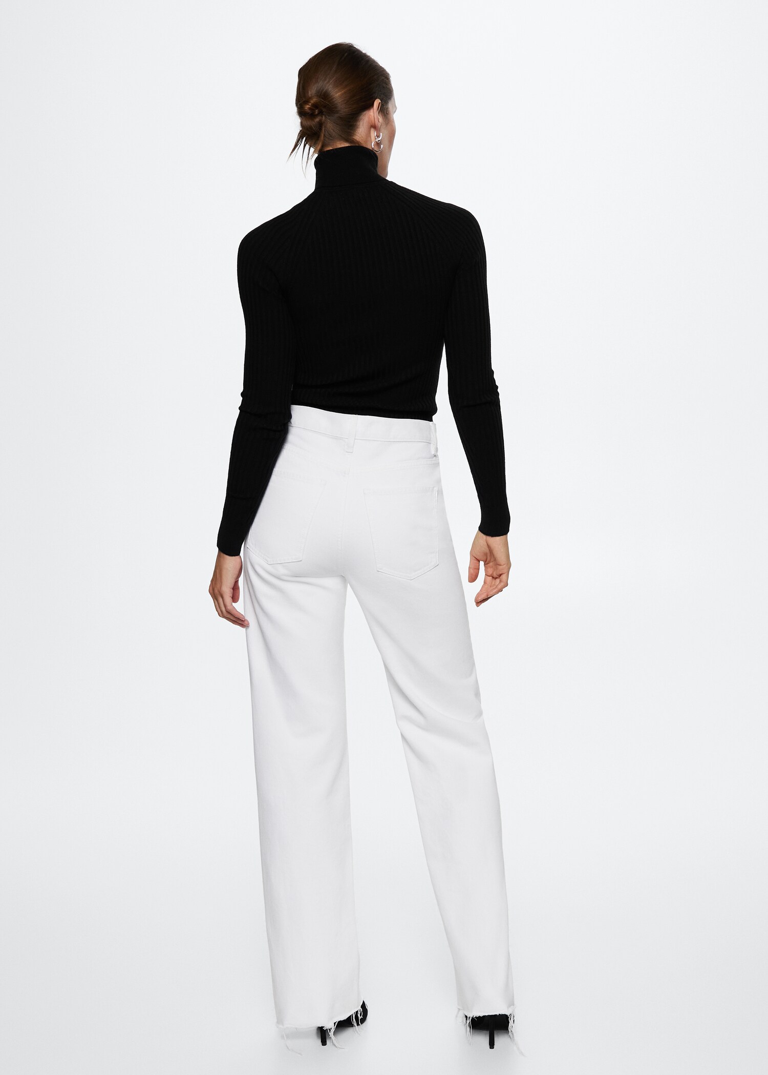 Rolled neck cable sweater - Reverse of the article