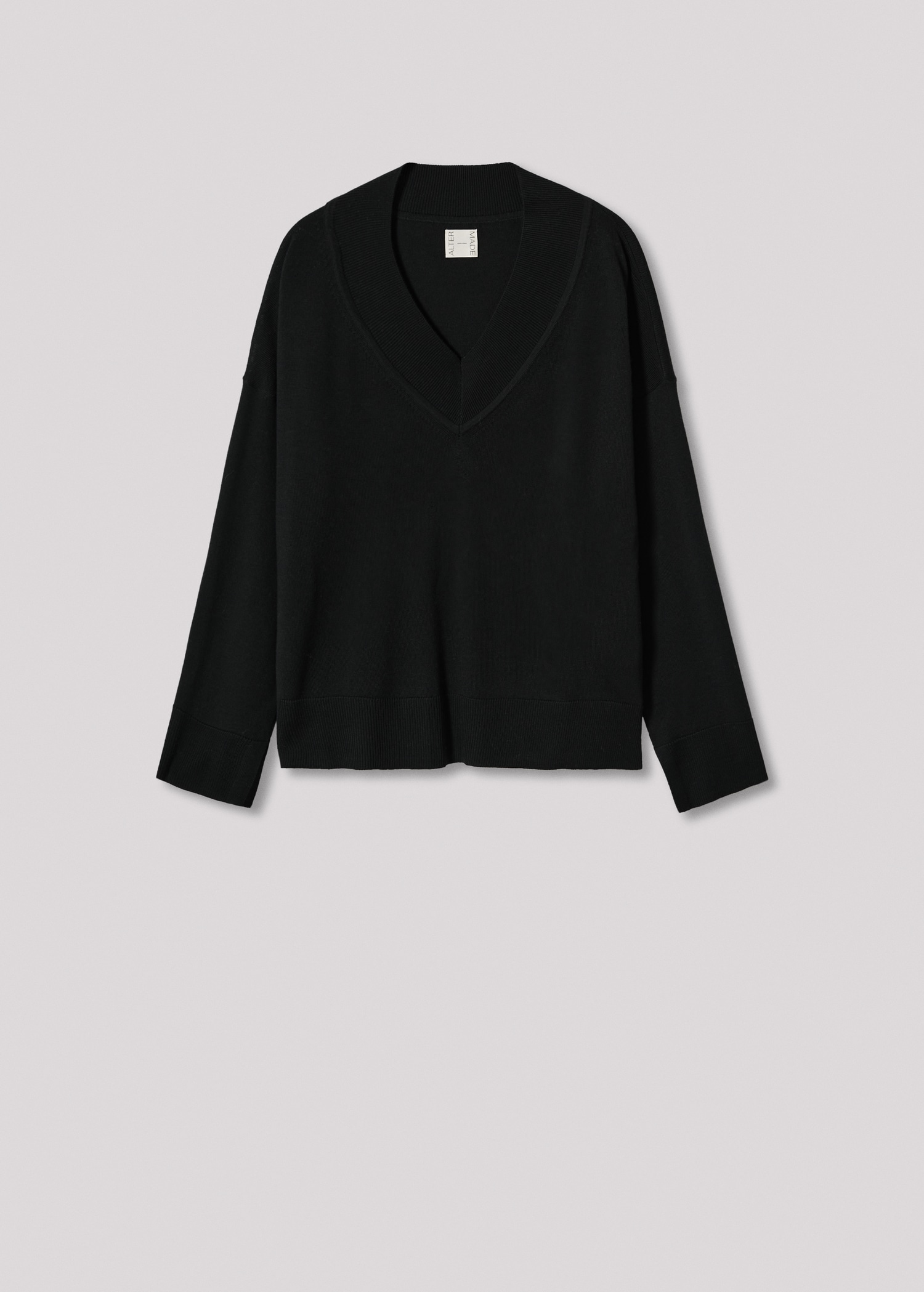 Pull-over en laine mérinos à col en V - Article sans modèle