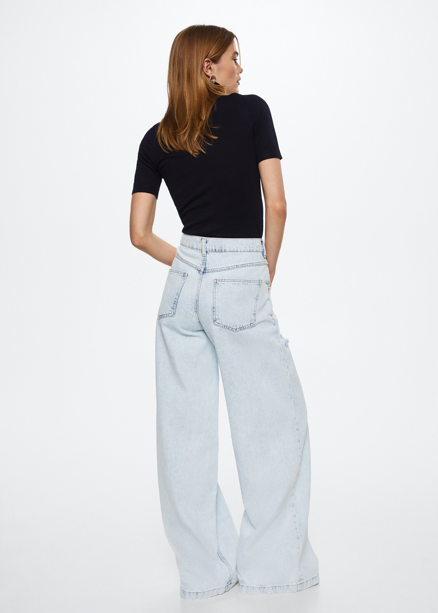 Turtleneck knitted sweater - Reverse of the article