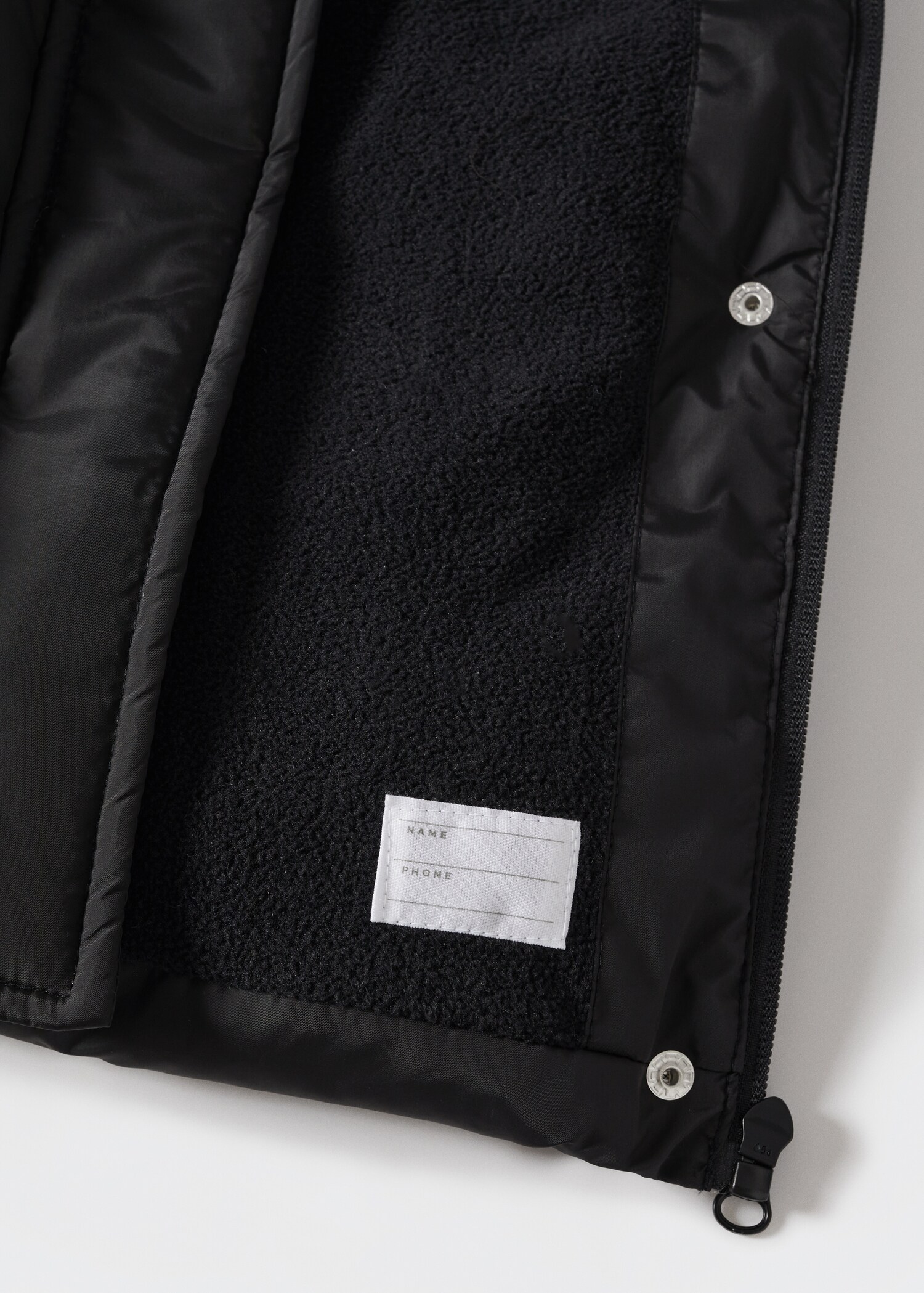 Gepolsterte Fleece-Weste - Detail des Artikels 8
