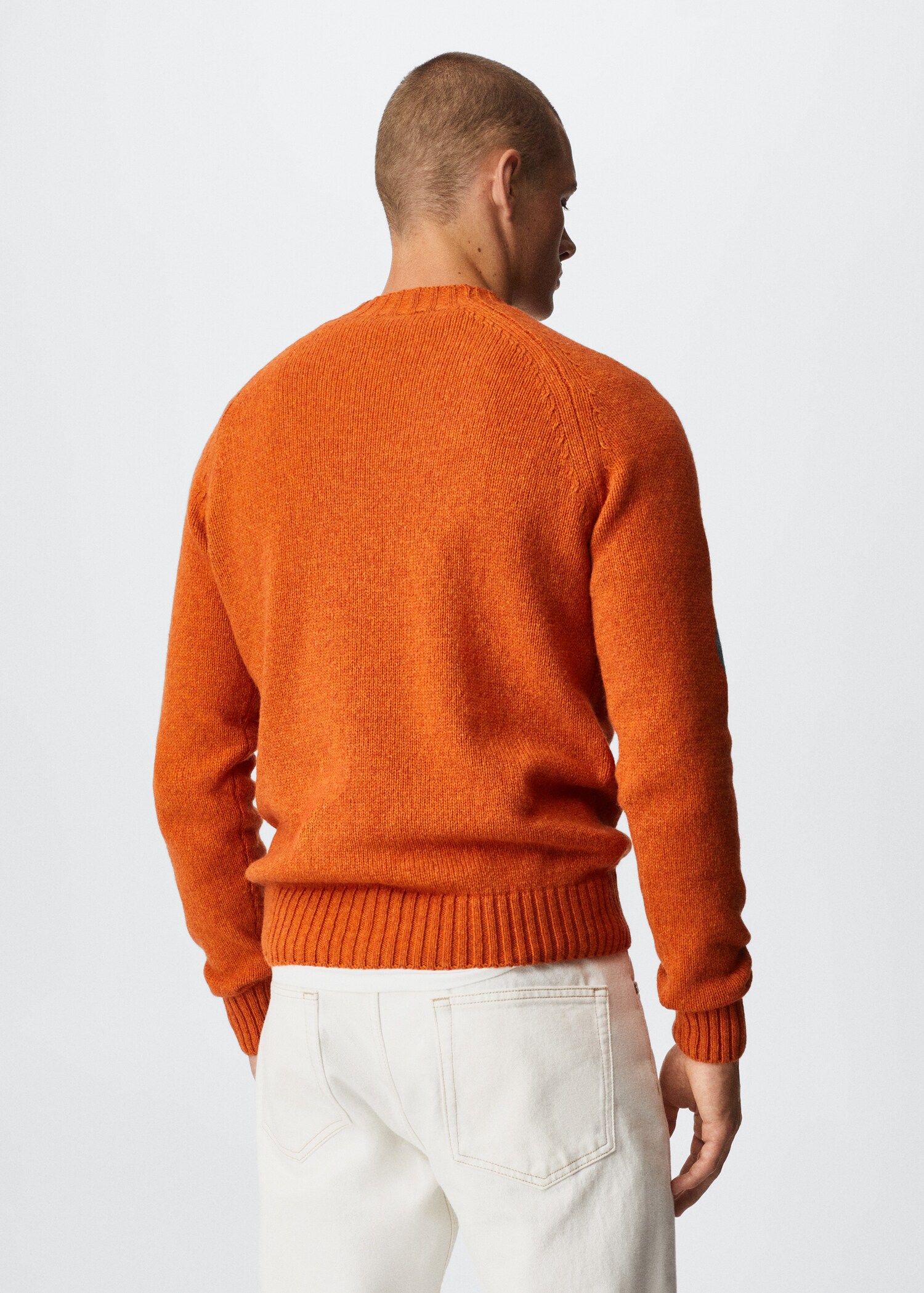 Rounded neck wool sweater - Reverse of the article