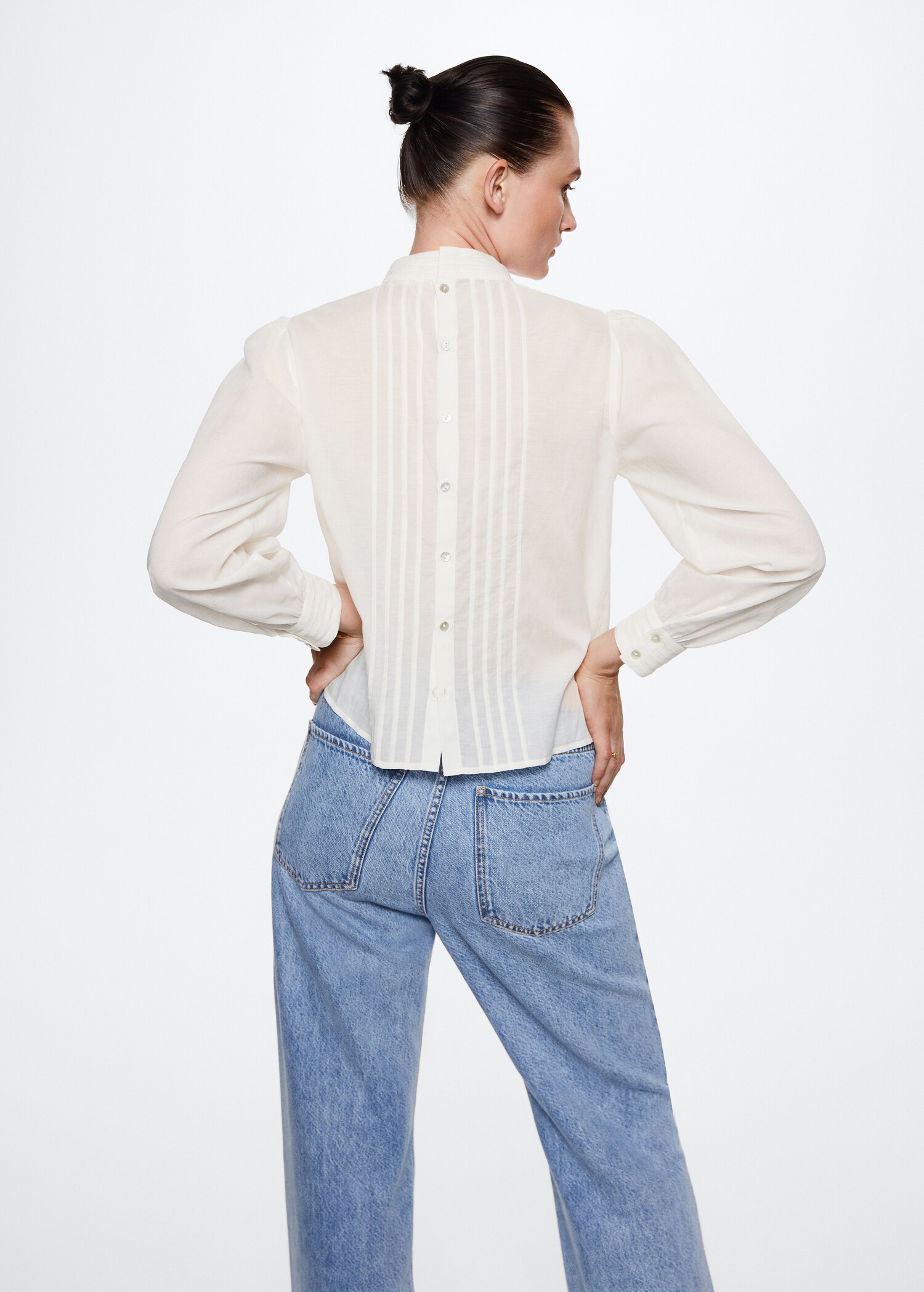 Blusa bordados decorativos - Reverso del artículo