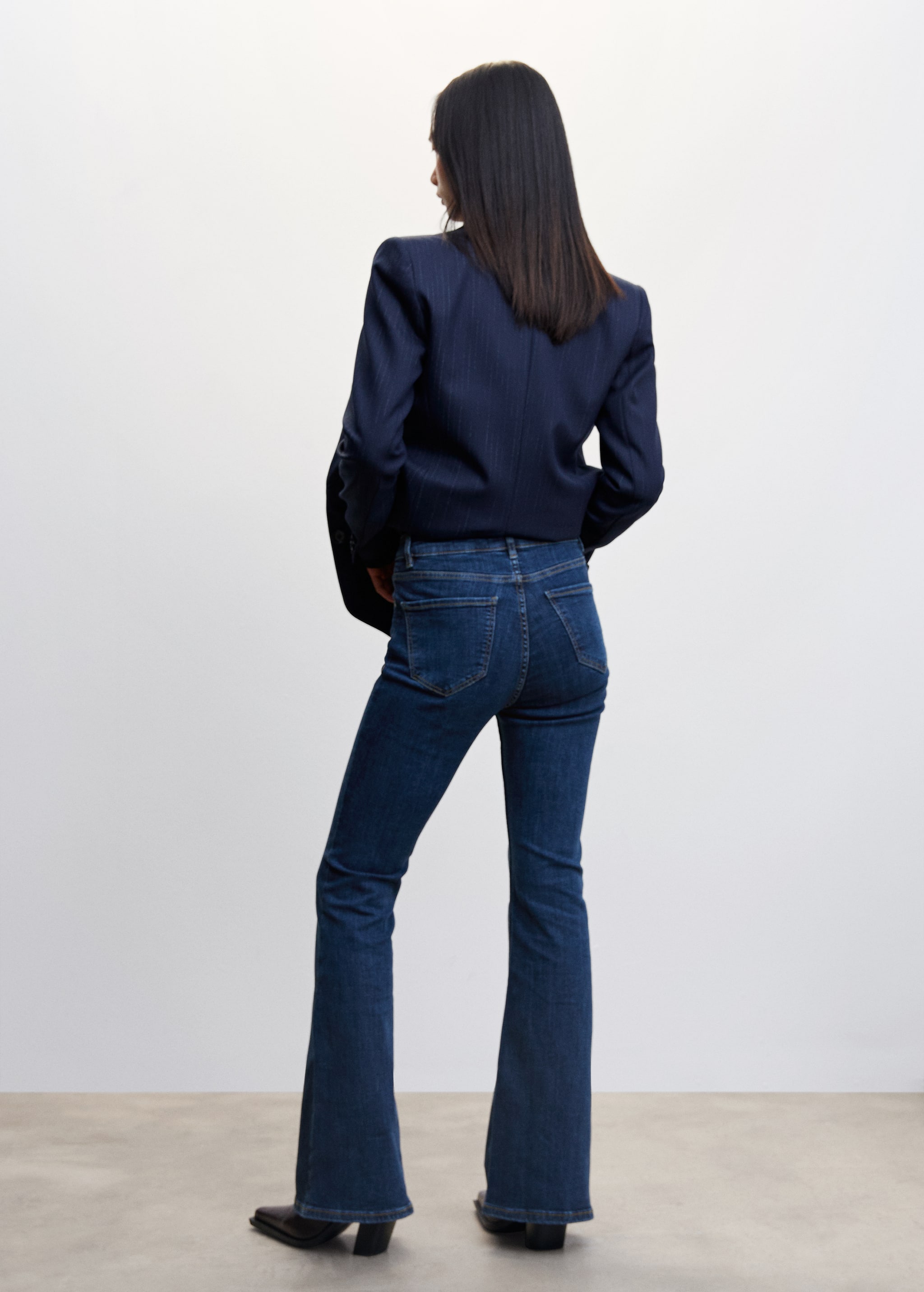 Mid-rise flared jeans - Reverse of the article