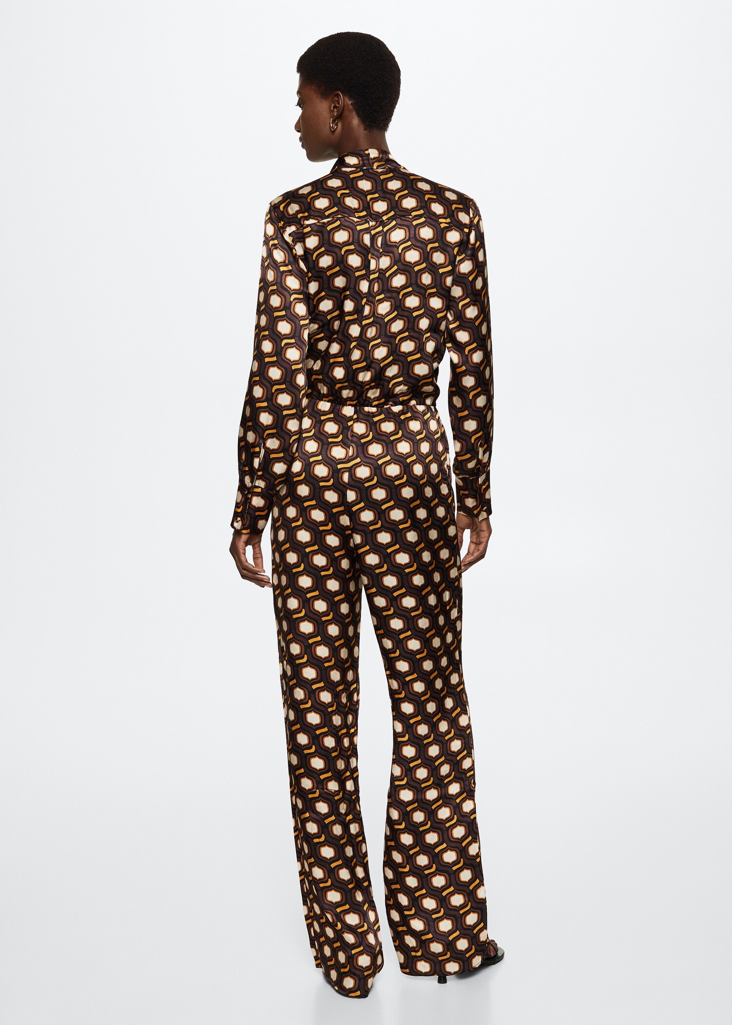 Lett jumpsuit med trykk - Baksiden av artikkelen