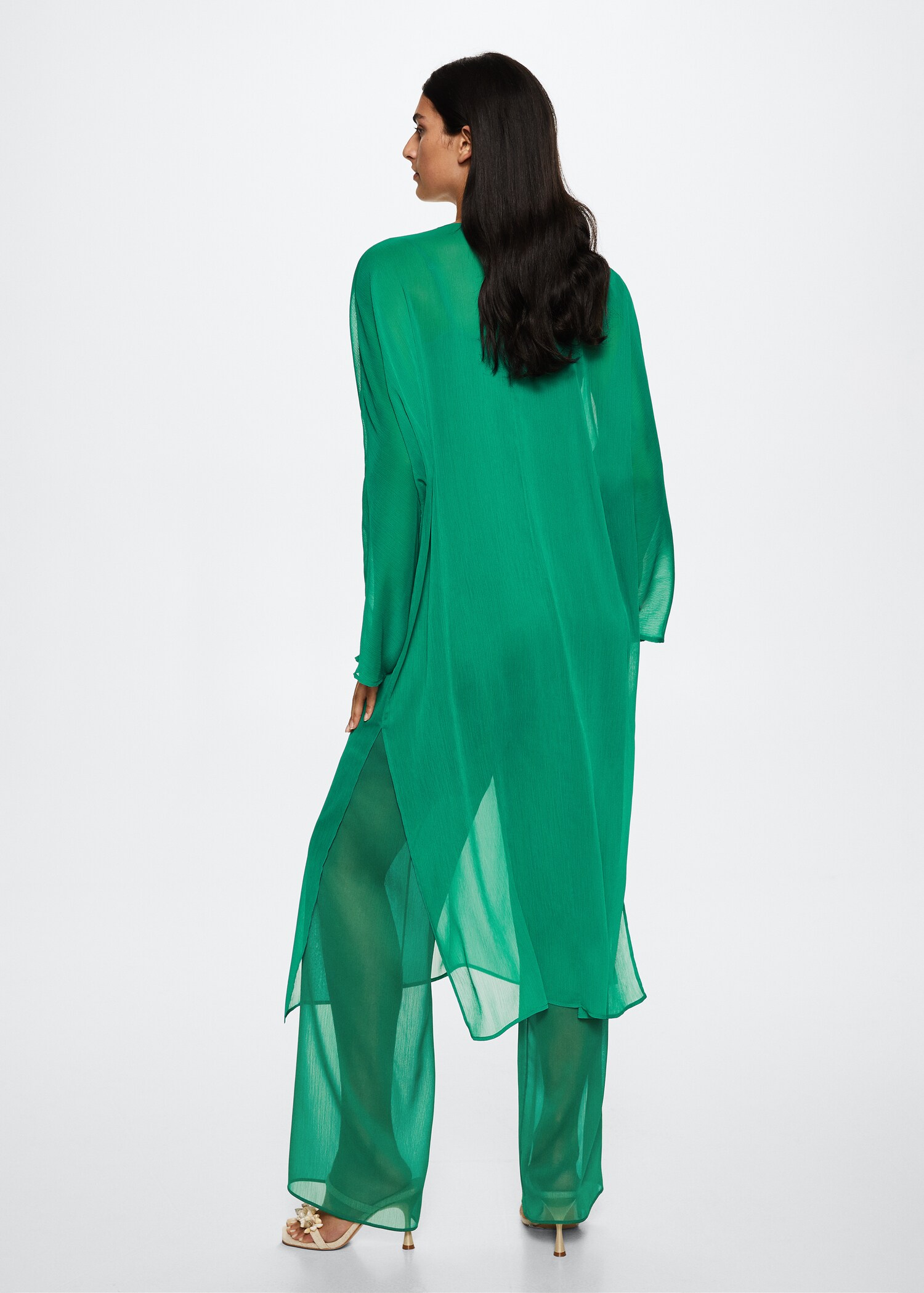 Blusa semitransparente - Reverso del artículo