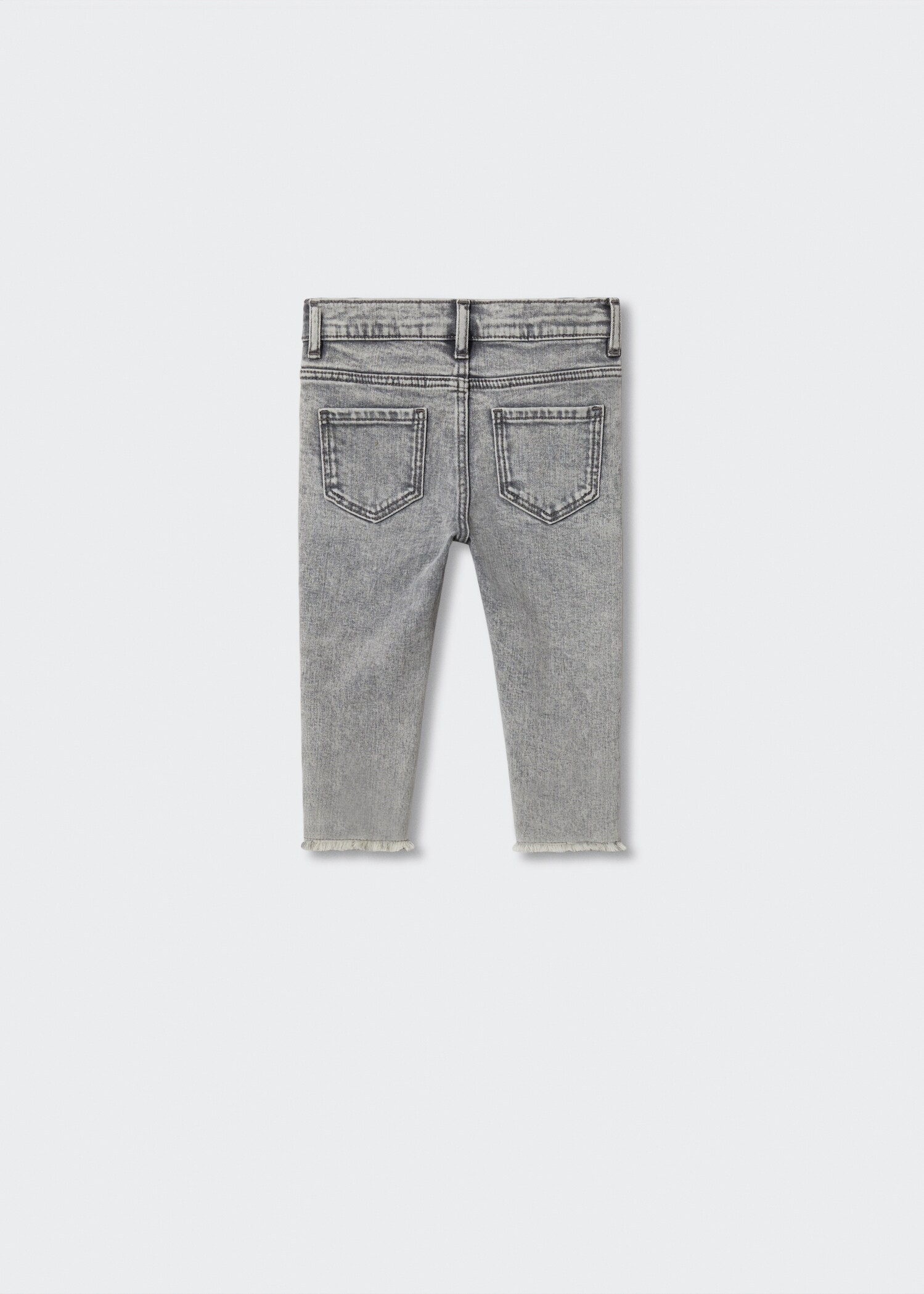 Skinny jeans with frayed hem  - Reverse of the article