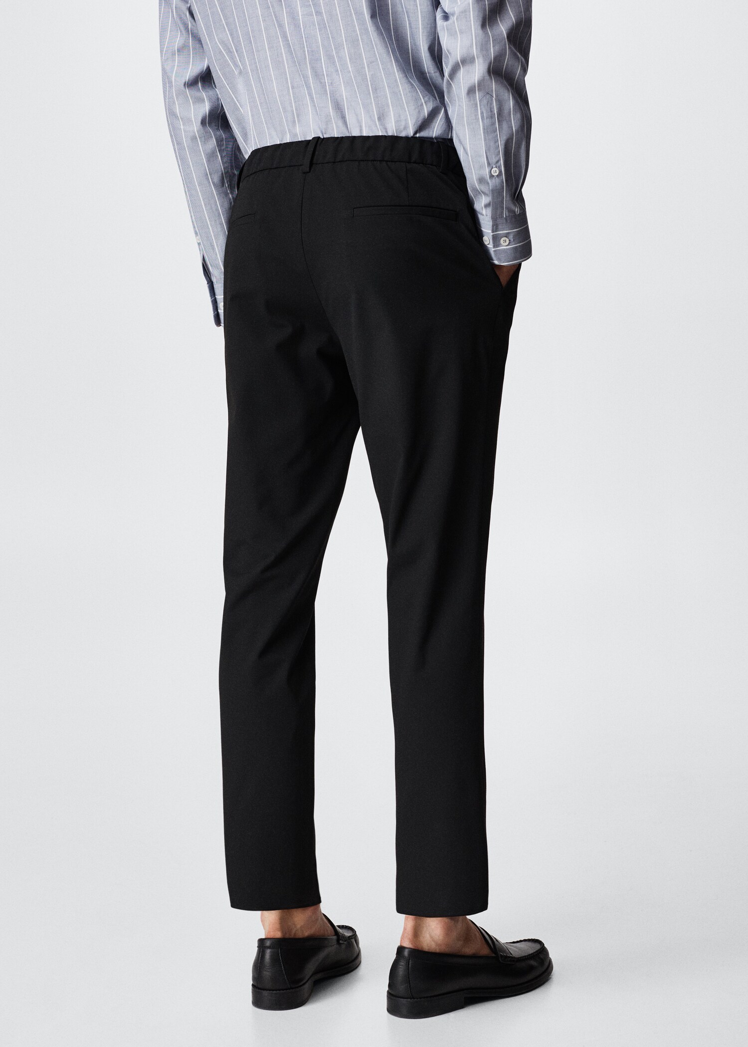 Tapered fit stretch trousers - Reverse of the article