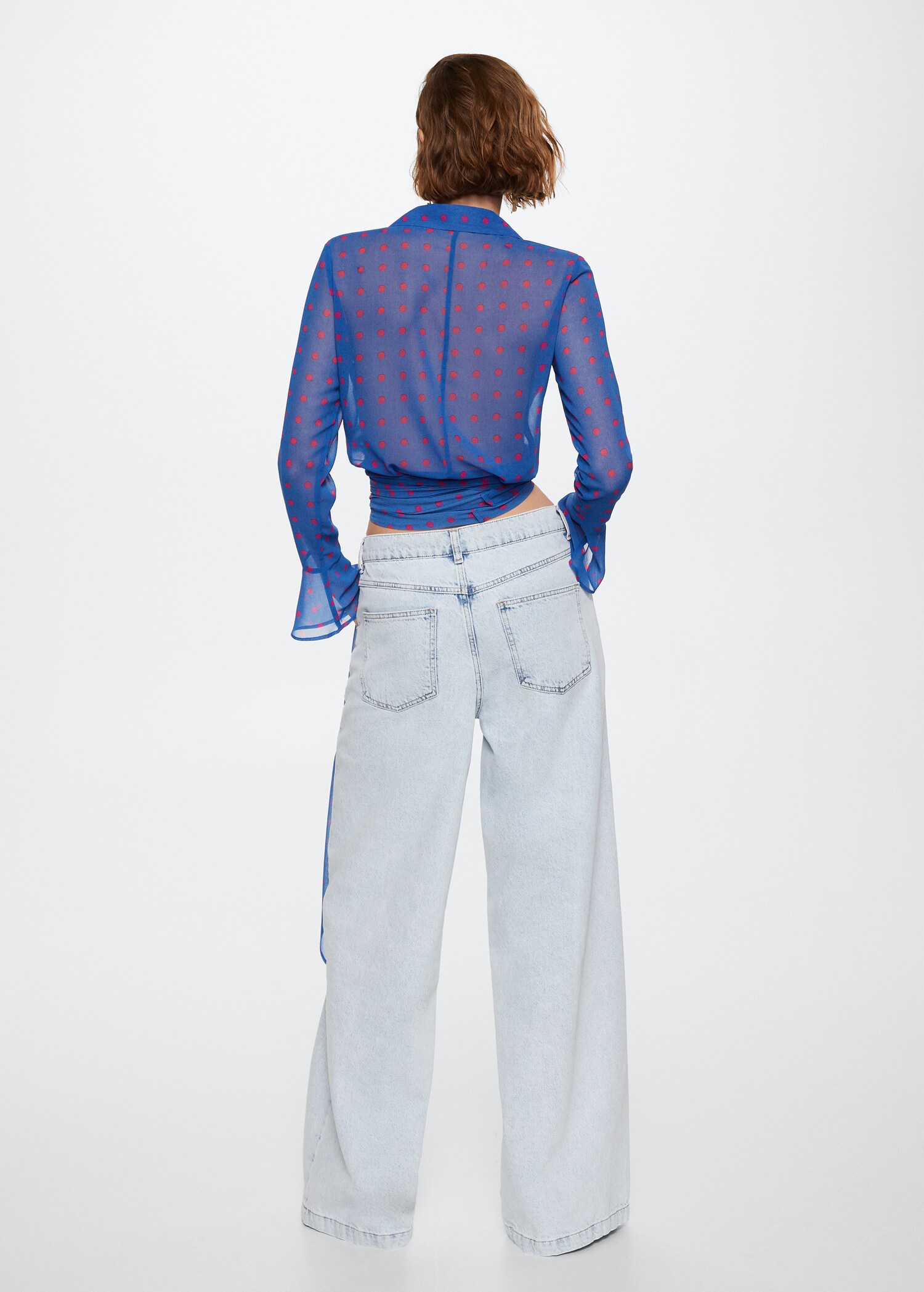 Blouse semi-transparente pois - Verso de l’article