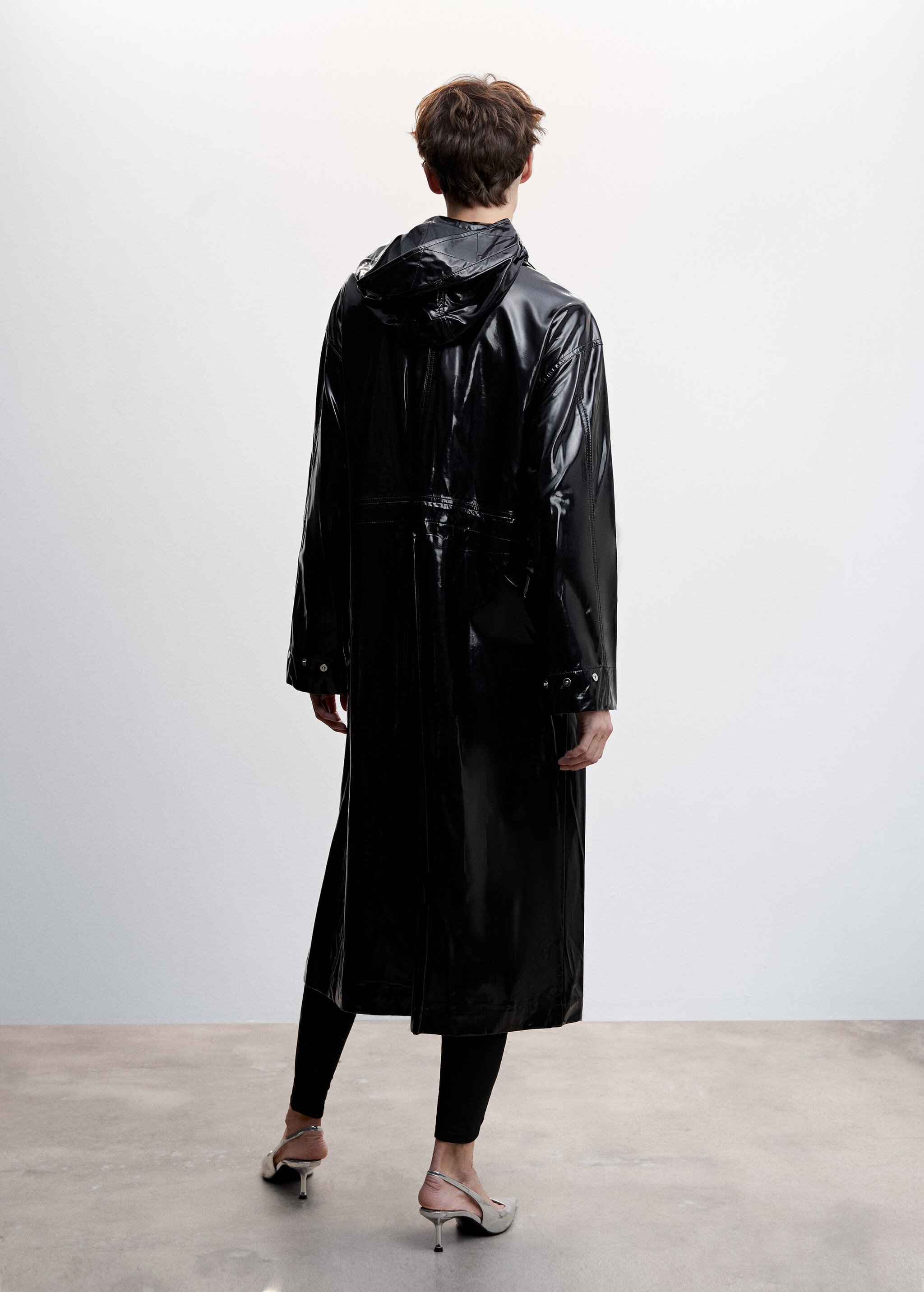 Patent leather hooded parka - Reverse of the article