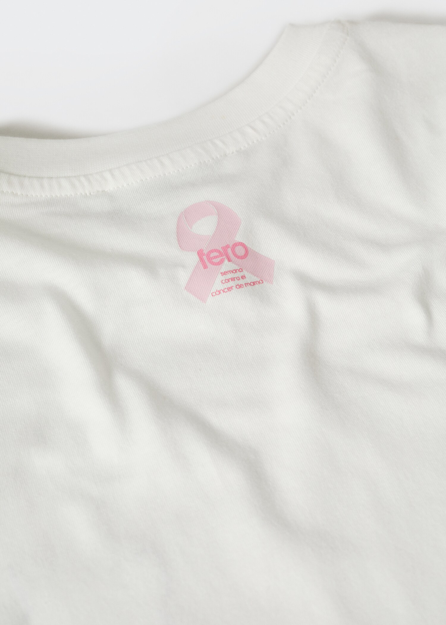 Camiseta solidaria bordado - Detalle del artículo 0