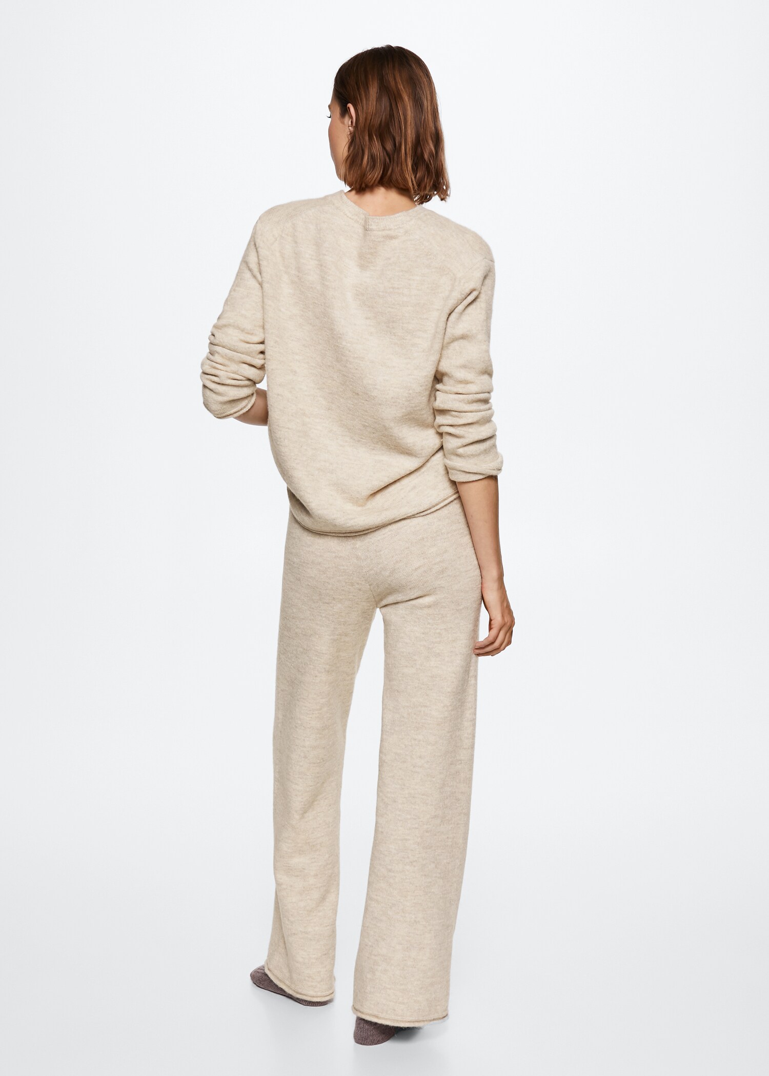 Knitted ribbed sweater - Reverse of the article