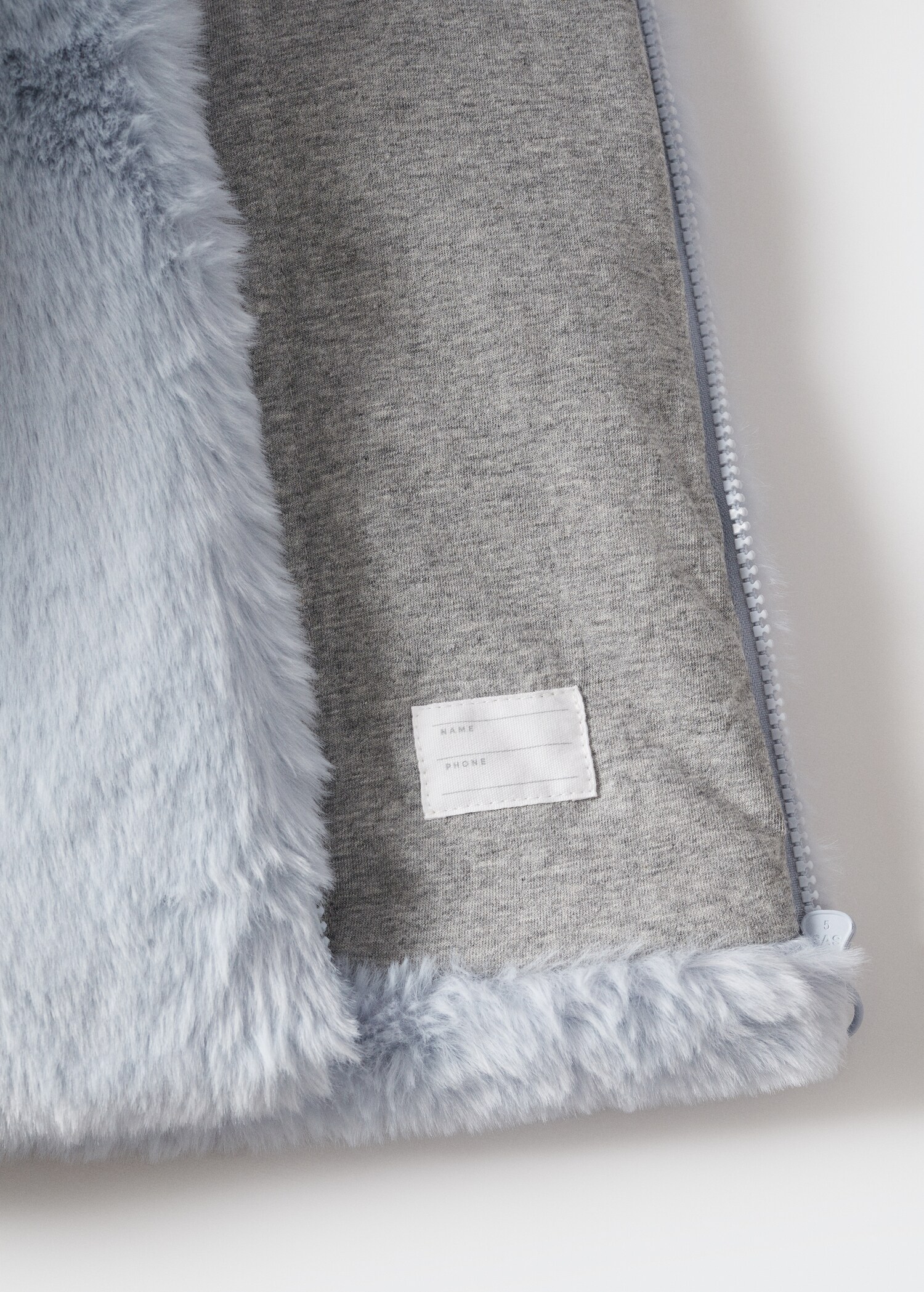Manteau fausse fourrure - Détail de l'article 8