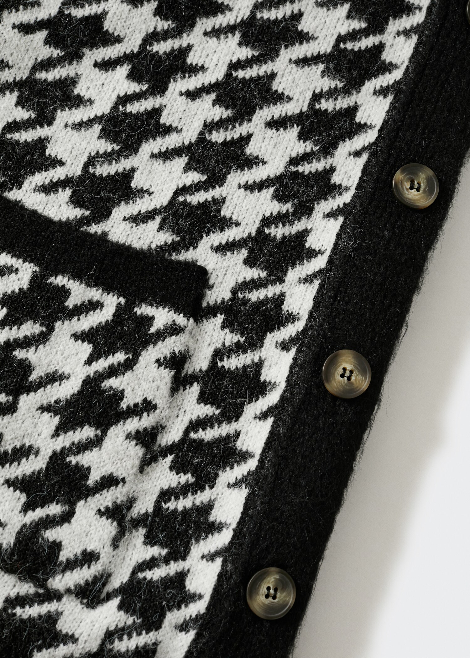 Pied-de-poule vest - Detail van het artikel 8