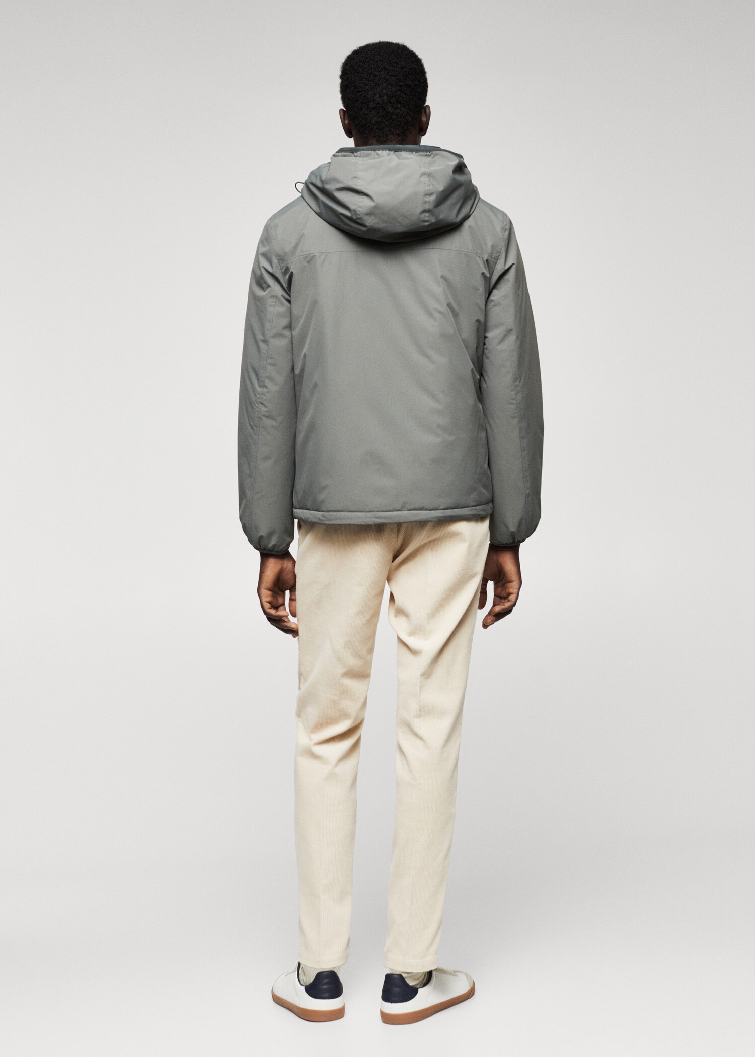 Raincoat hooded jacket - Reverse of the article