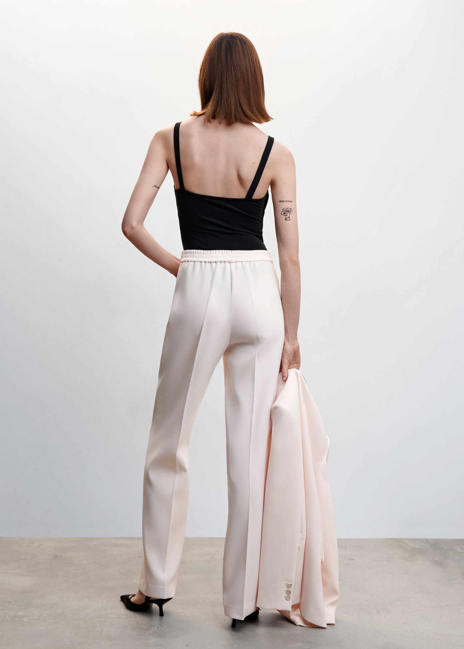 Elastic waist suit trousers - Reverse of the article