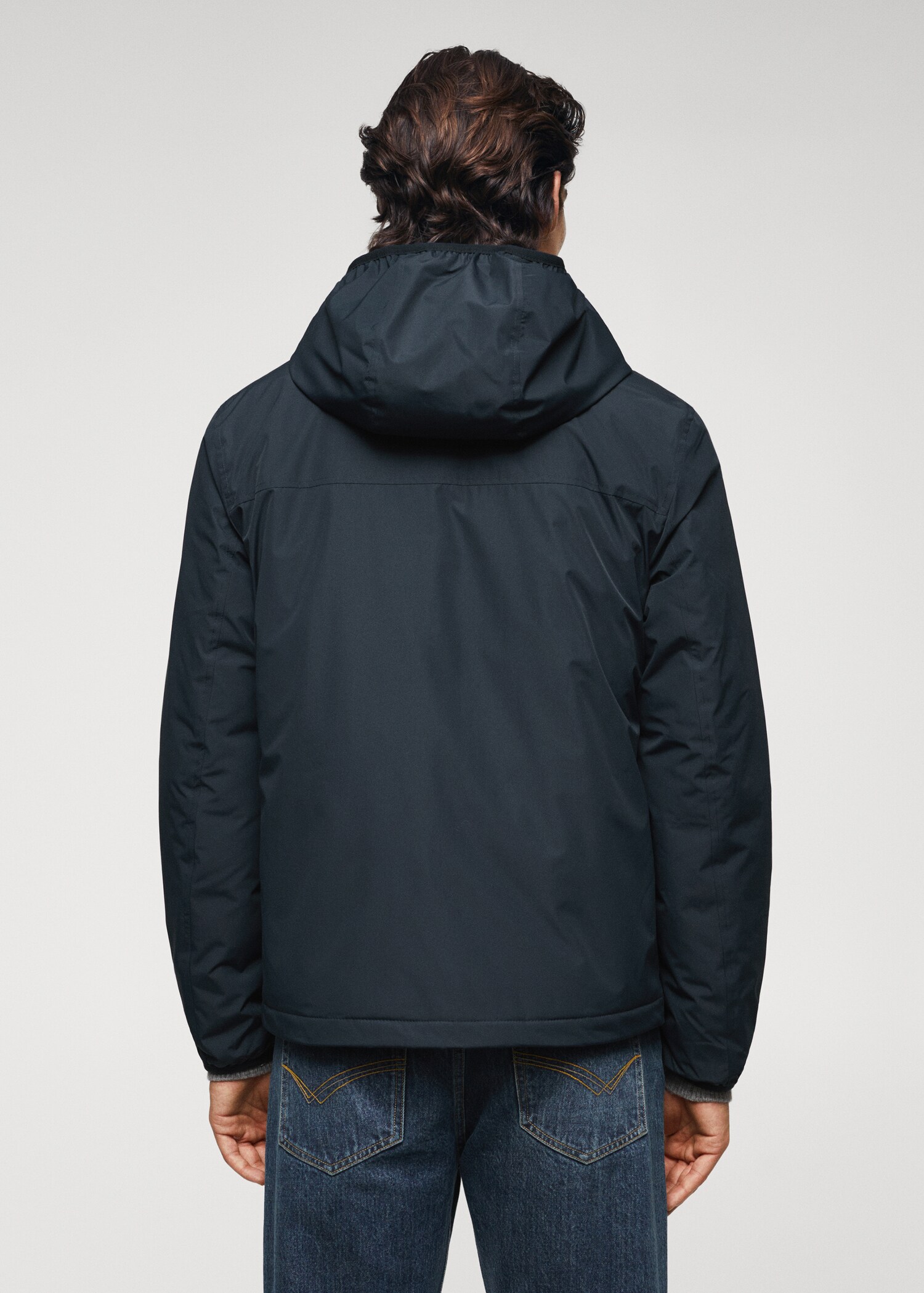 Raincoat hooded jacket - Reverse of the article