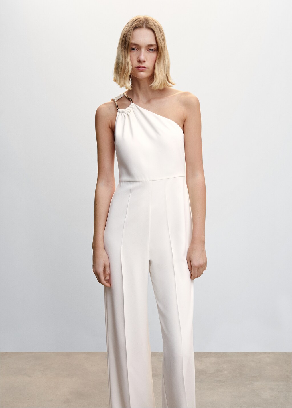 Asymmetrical jumpsuit with metallic detail Women MANGO Libya