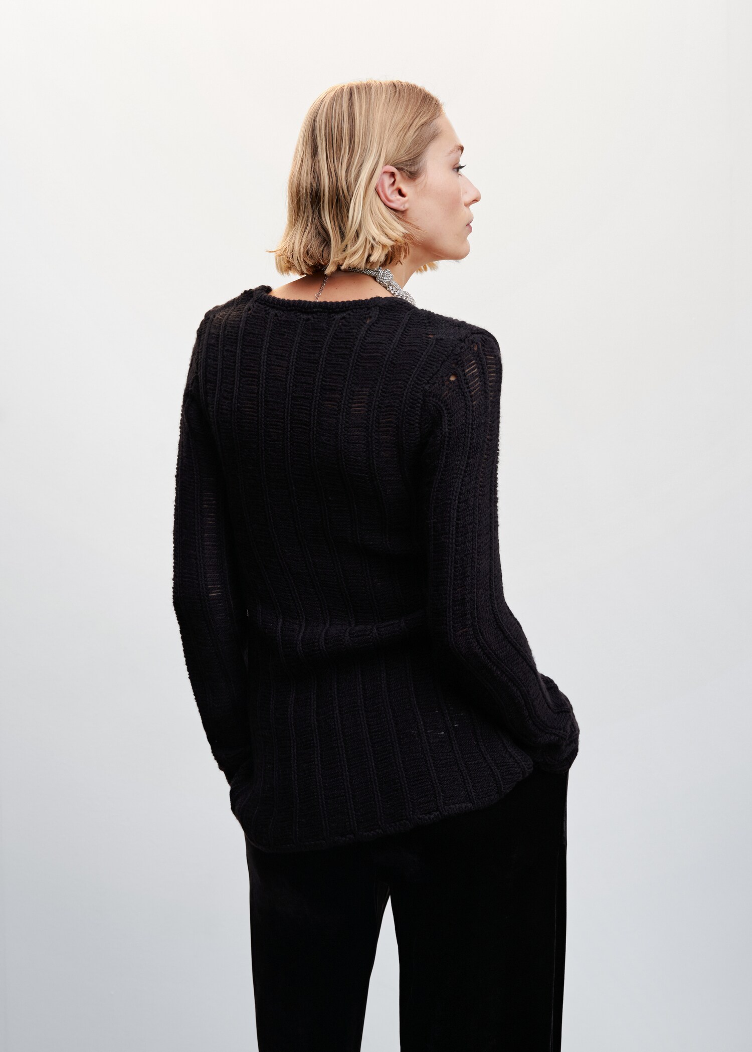 Knitted cardigan with bow - Reverse of the article