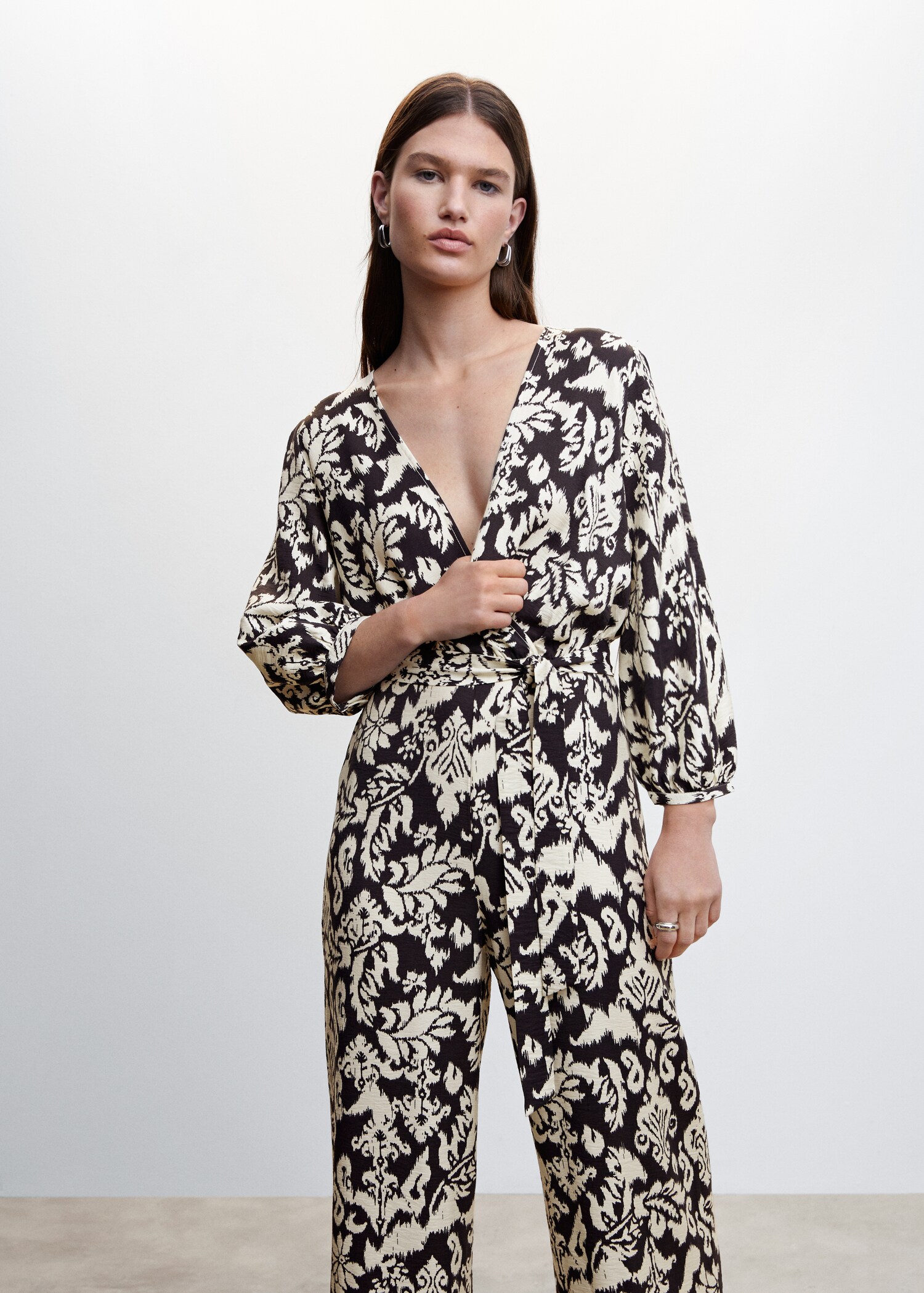 Geometric-print jumpsuit with bow - Medium plane