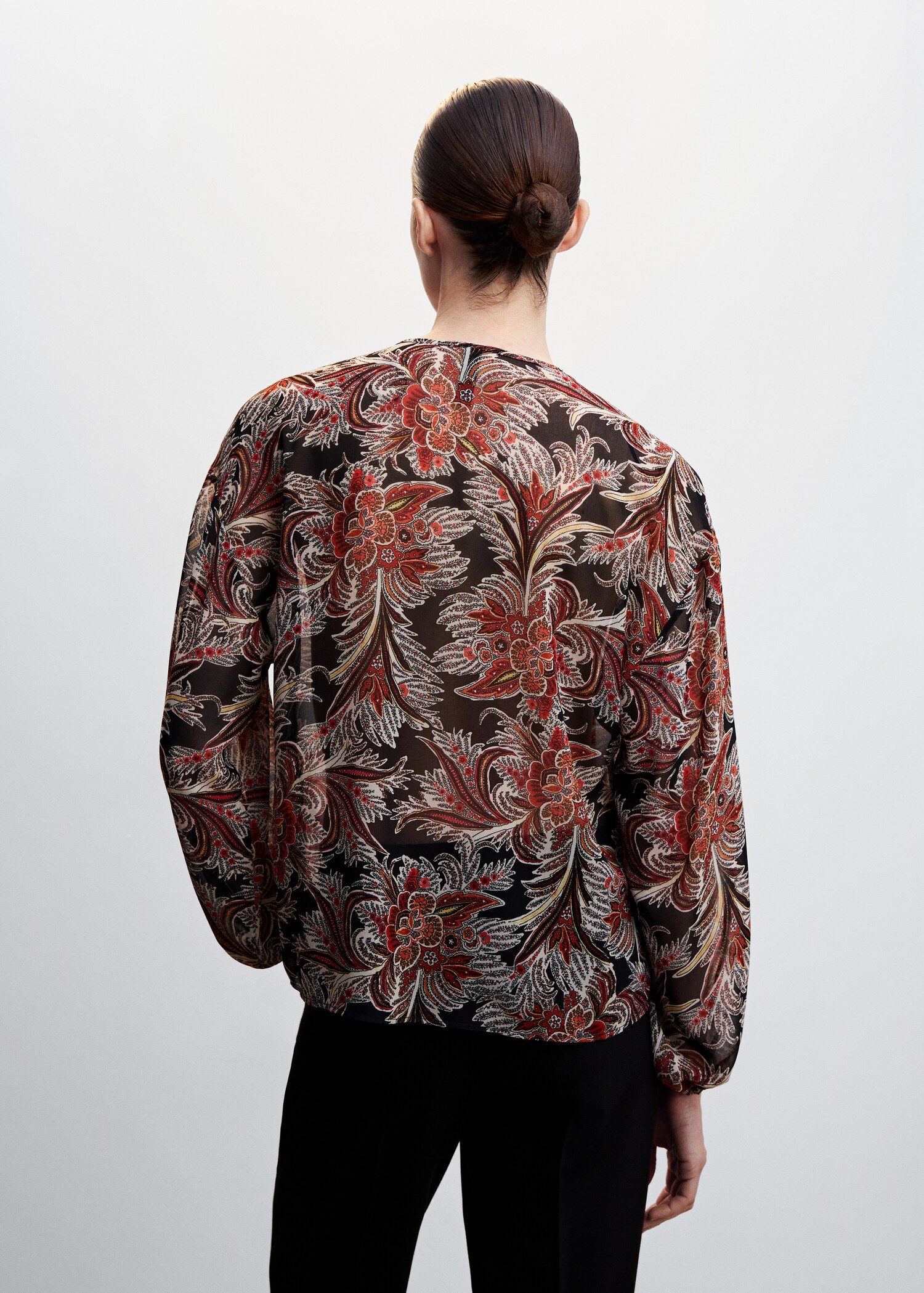 Blusa volantes lazo - Reverso del artículo