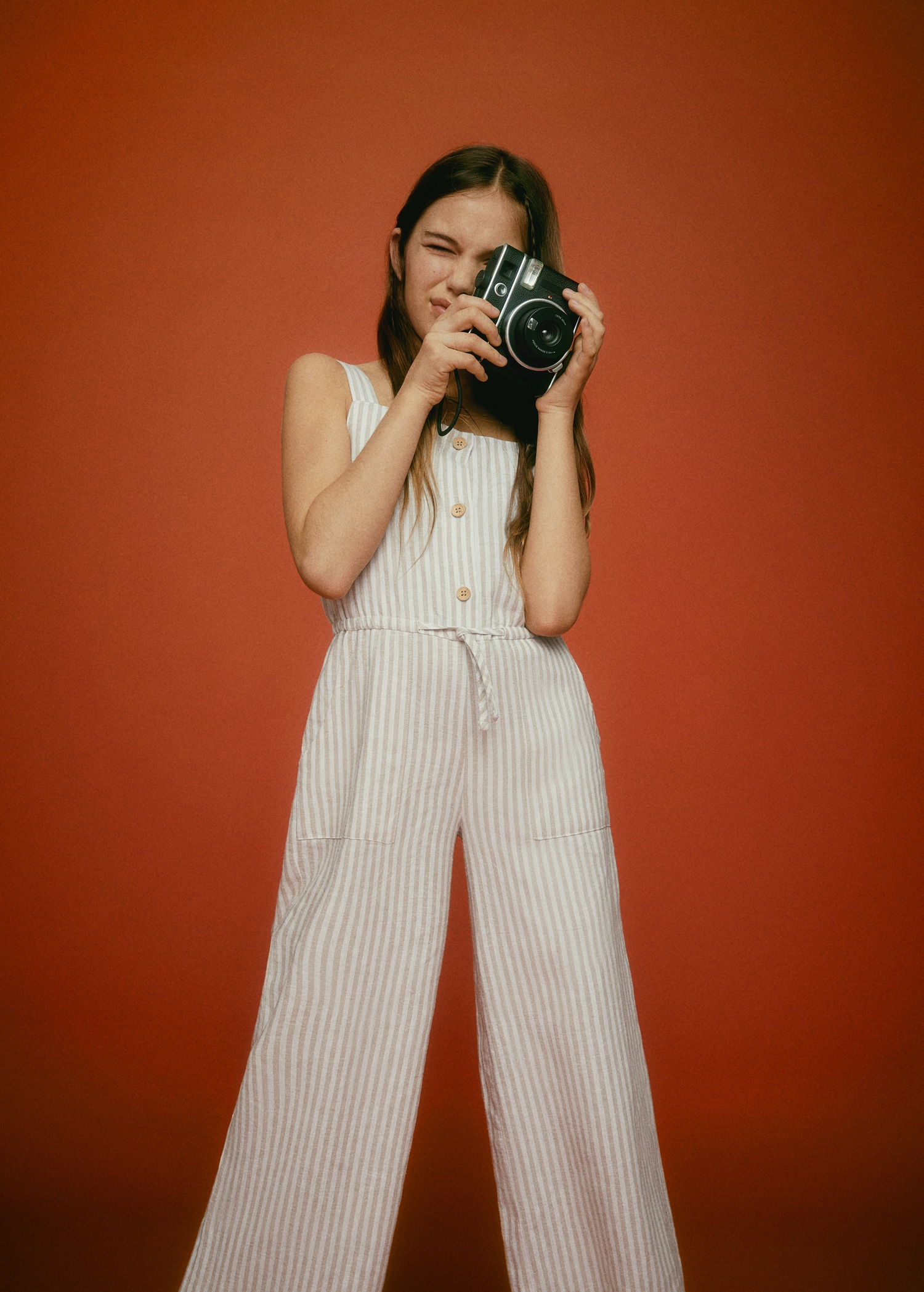 Linen-blend striped jumpsuit