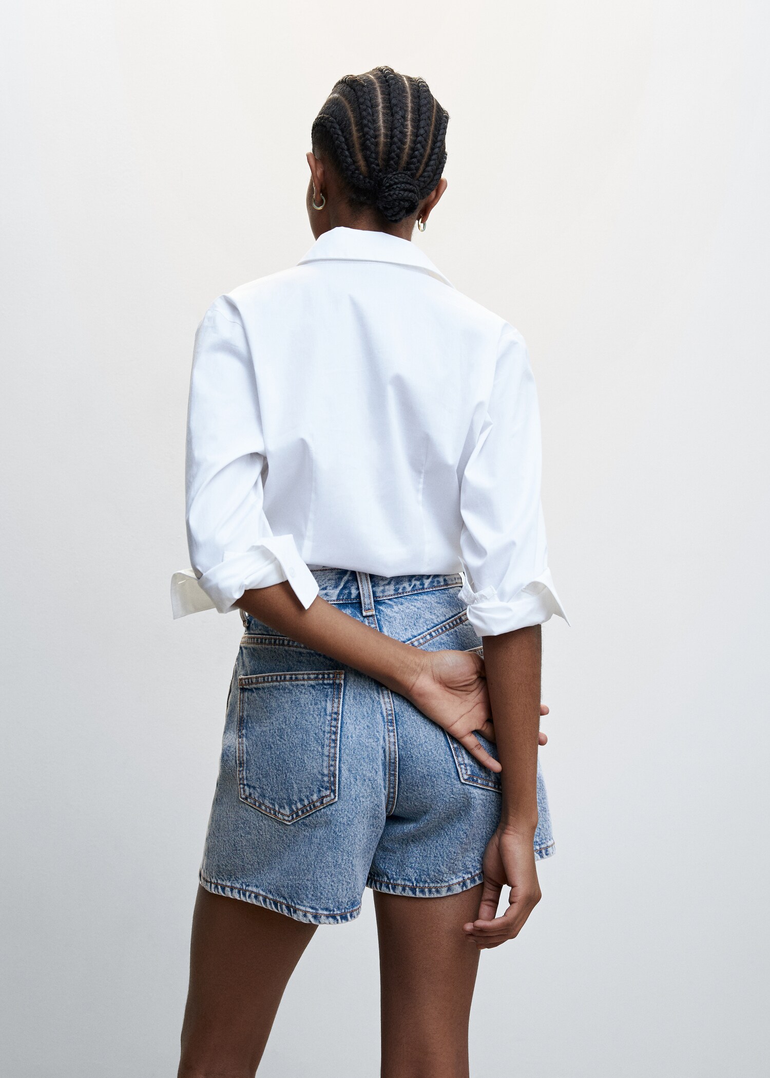 High-rise denim shorts - Reverse of the article