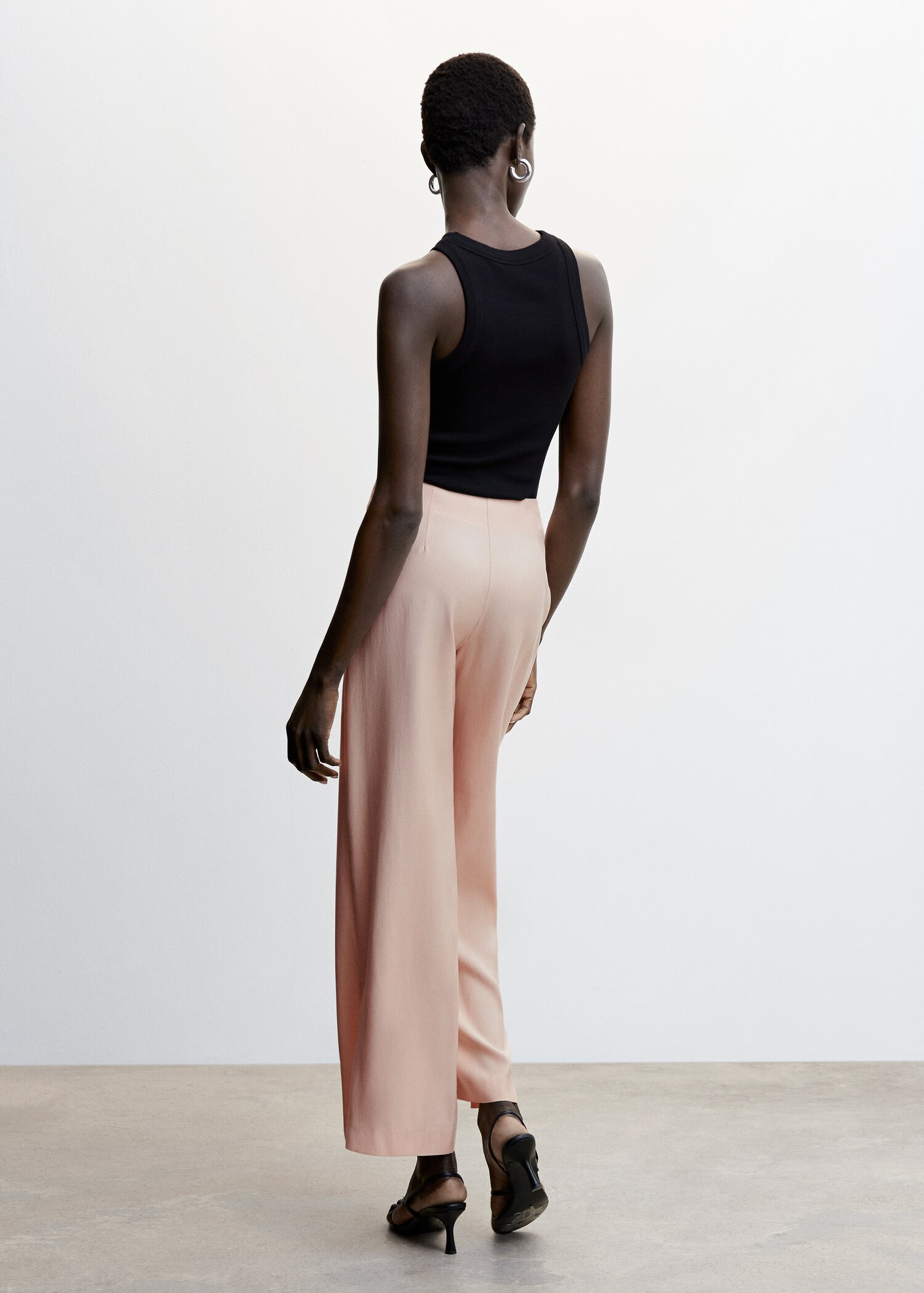 Slit hem trousers - Reverse of the article