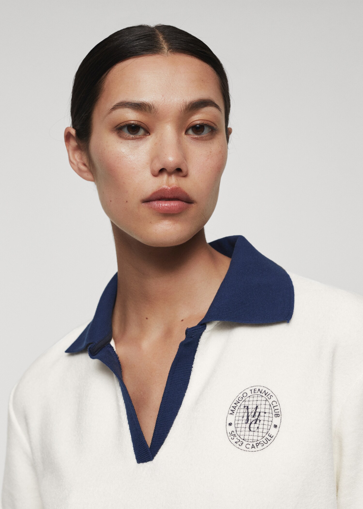 Textured polo shirt with logo - Details of the article 1