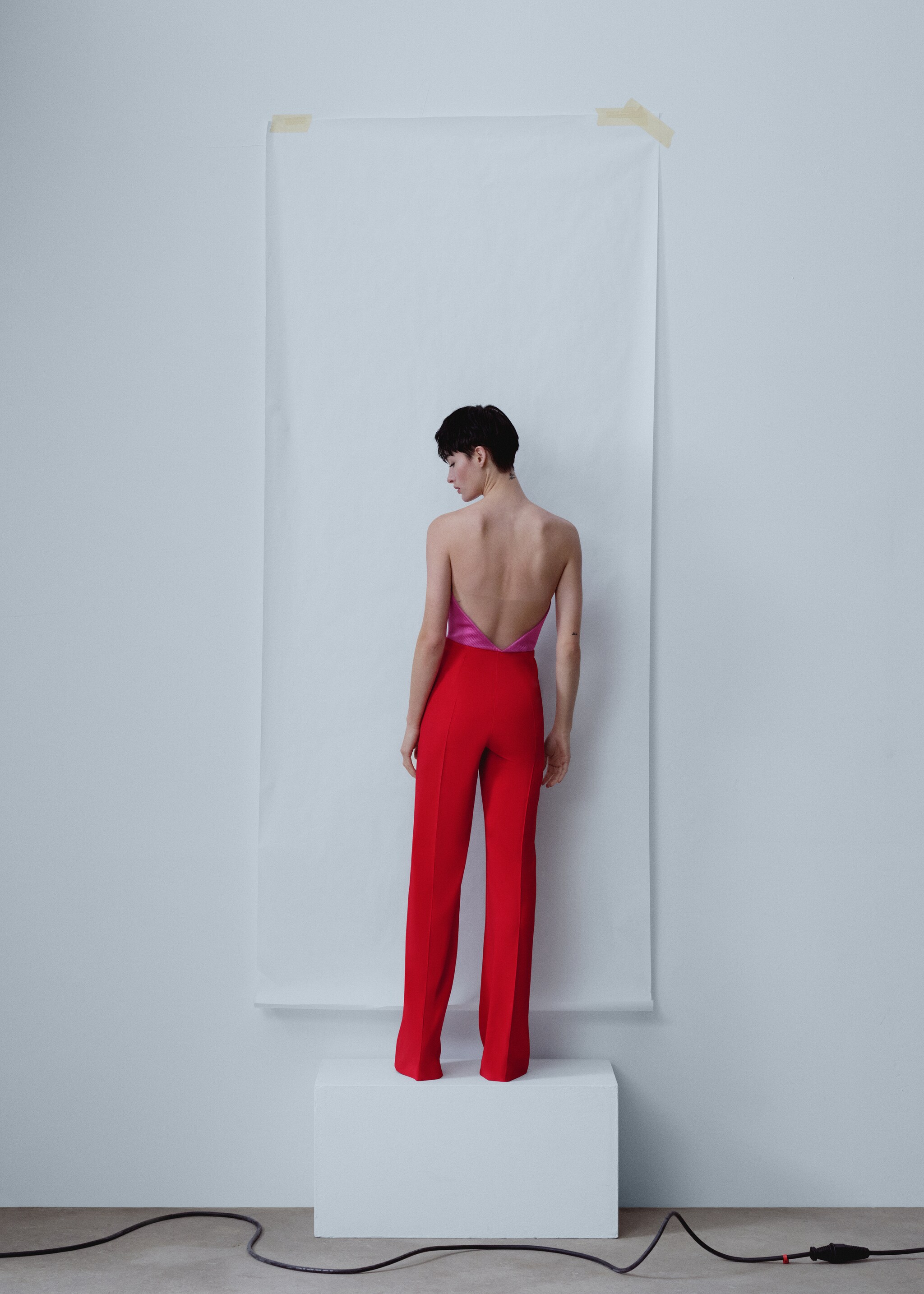 Two-tone jumpsuit with opening detail - Reverse of the article