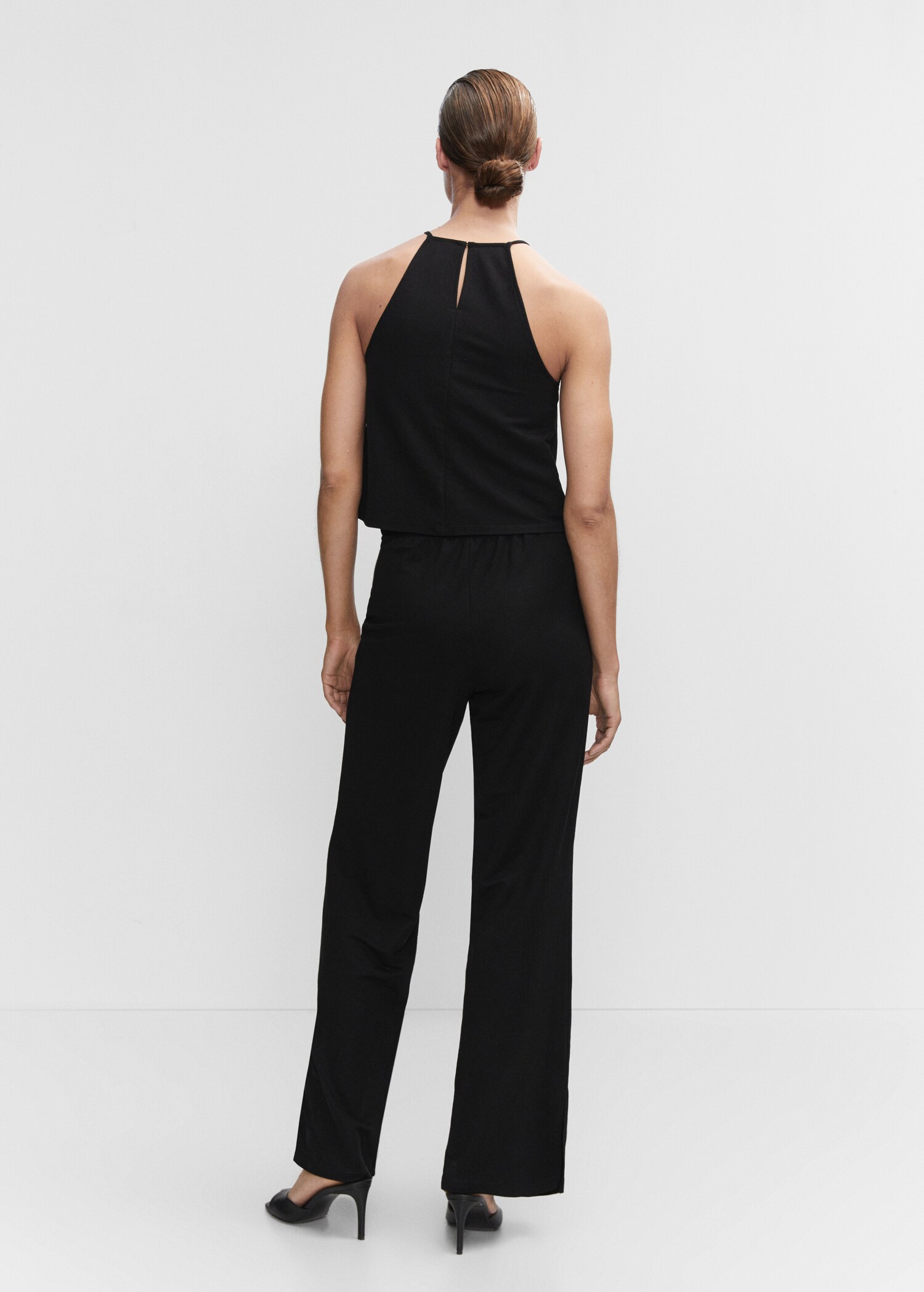 Straight trousers with openings - Reverse of the article