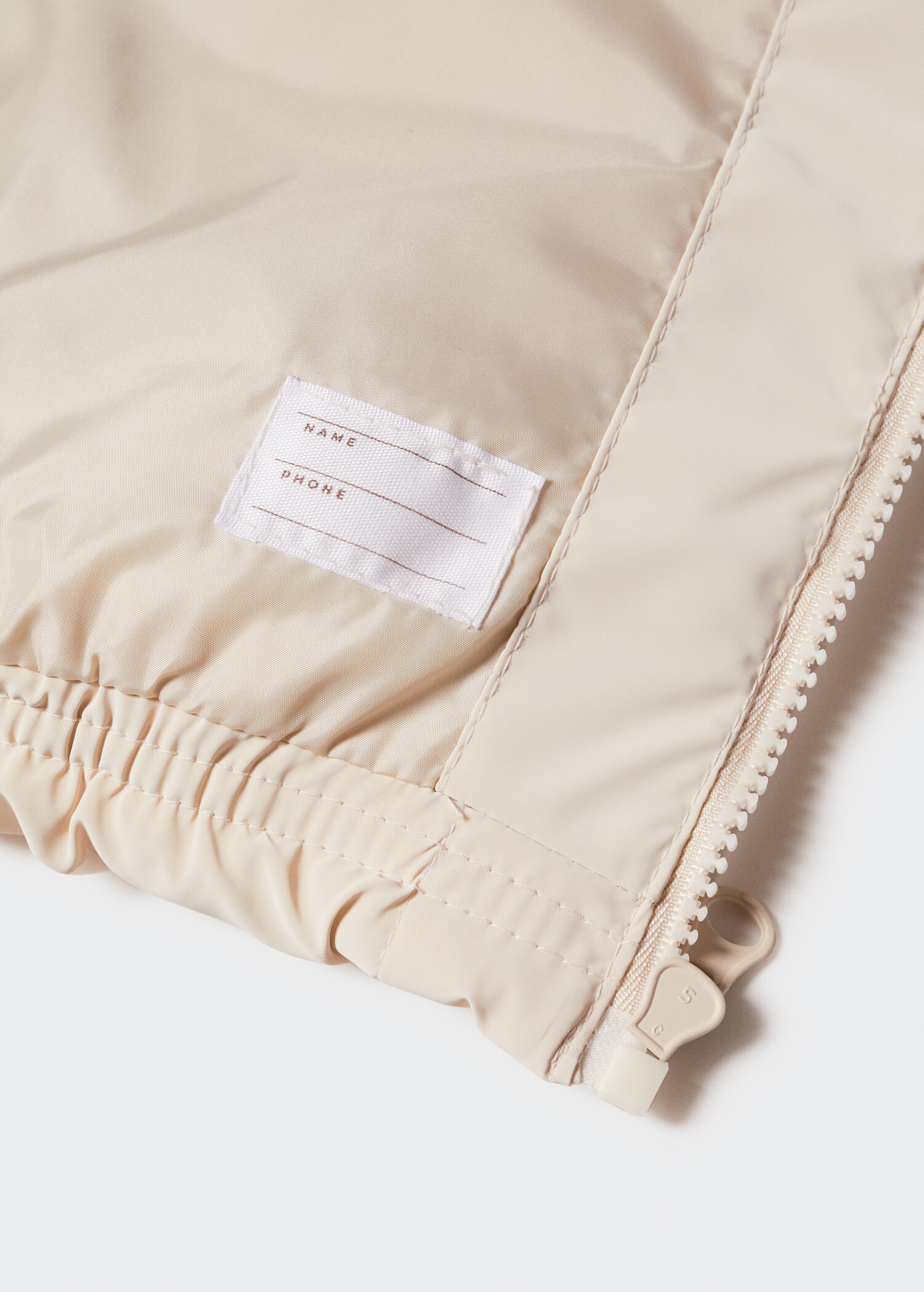 Gilet matelassé à capuche - Détail de l'article 0