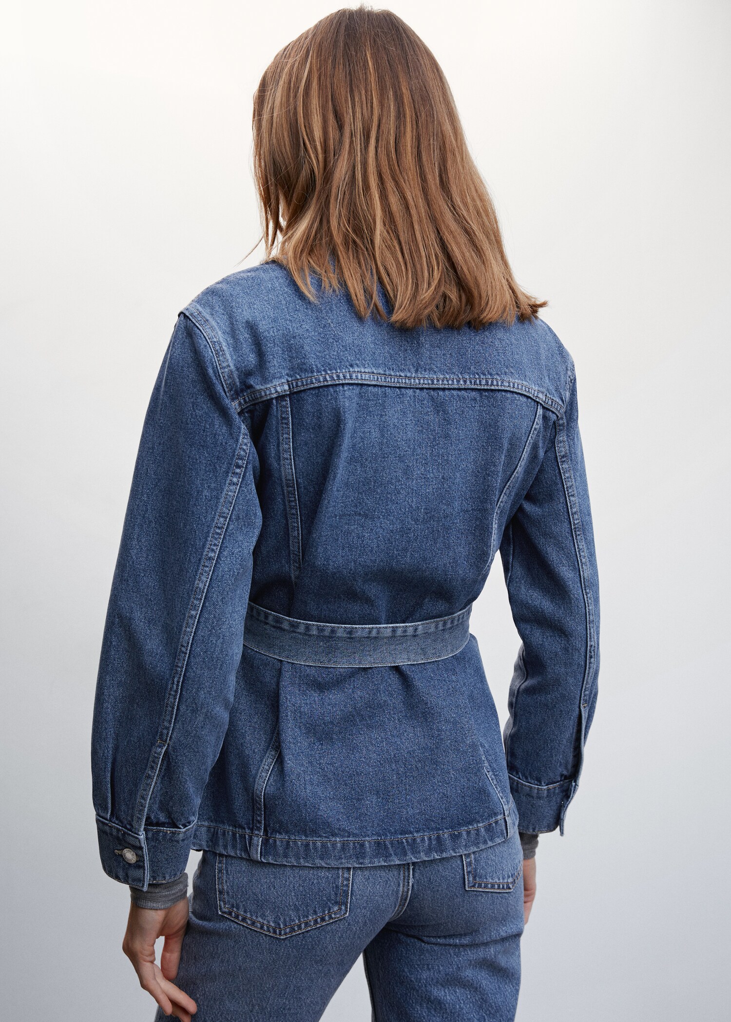 Denim jacket with belt - Reverse of the article