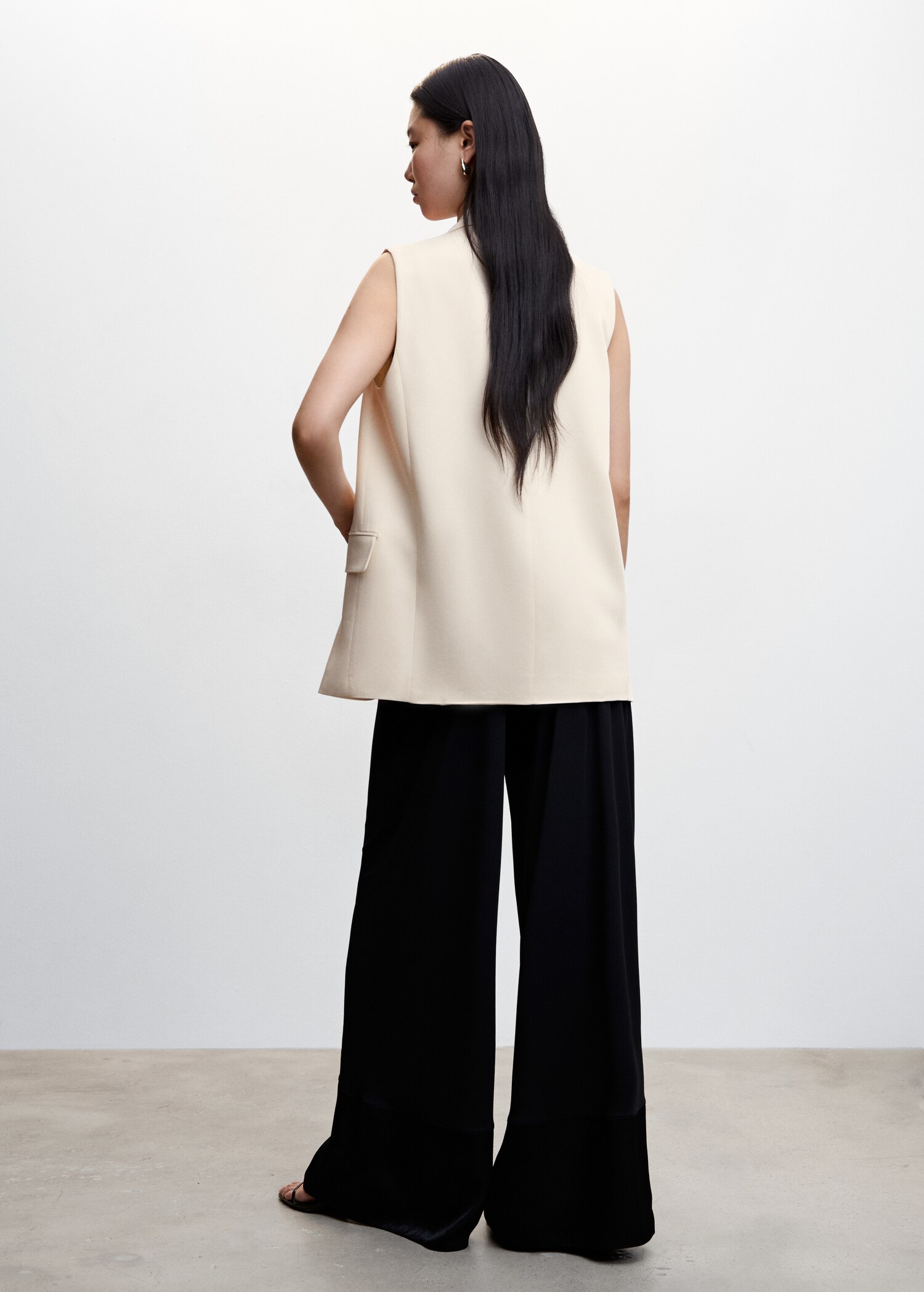 Gilet with pockets - Reverse of the article