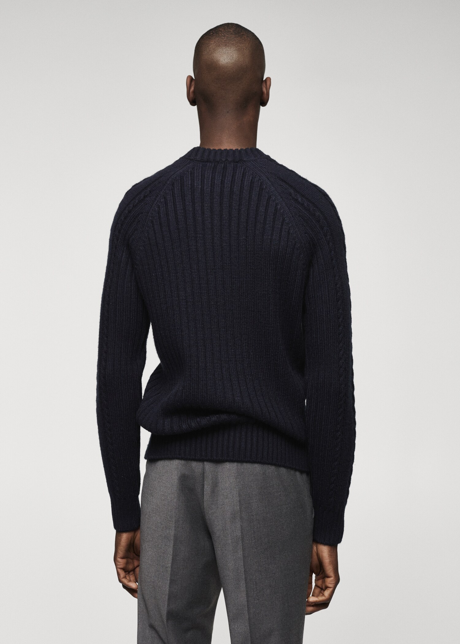 Knitted braided sweater - Reverse of the article