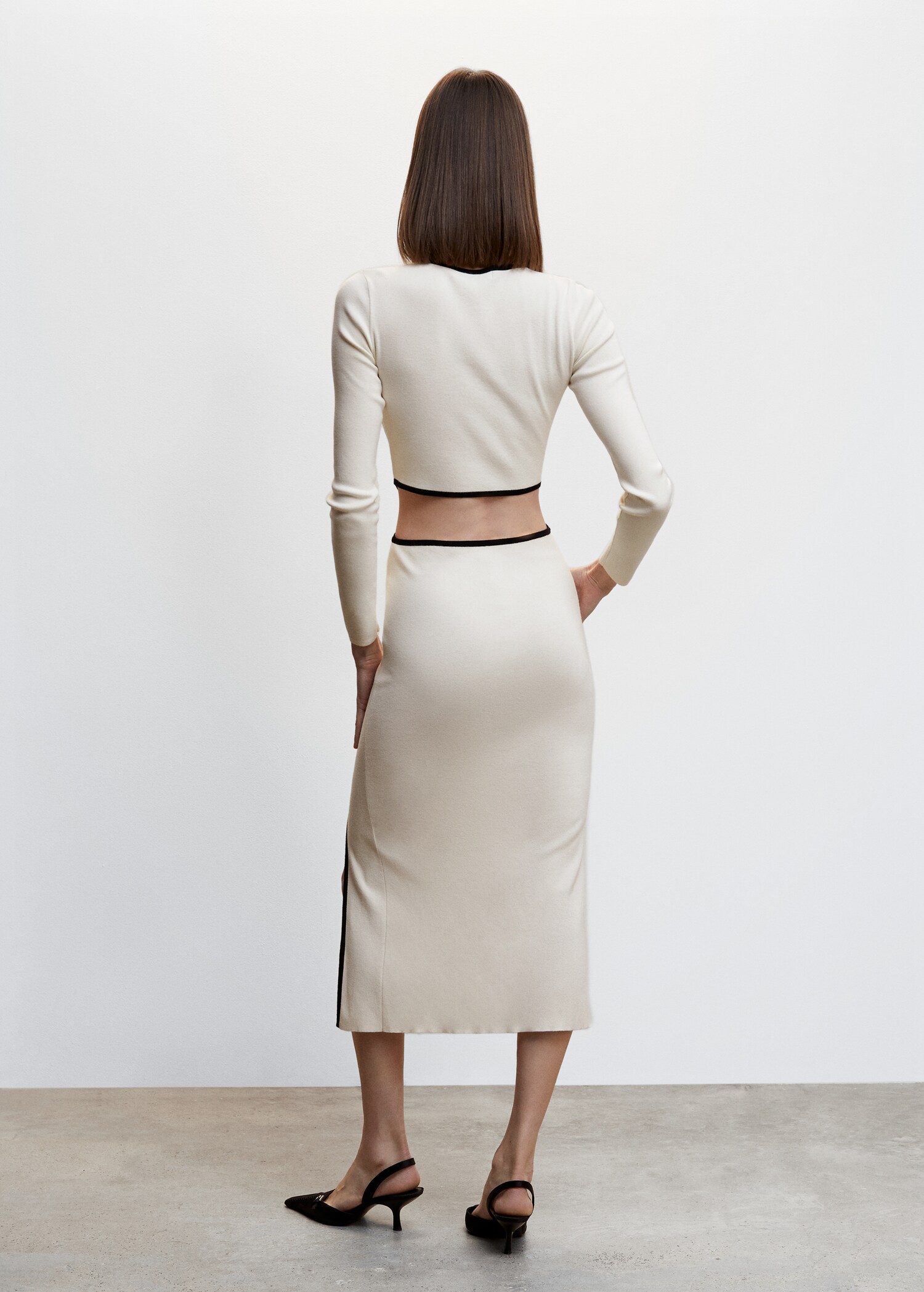 Vestido punto aberturas - Reverso del artículo