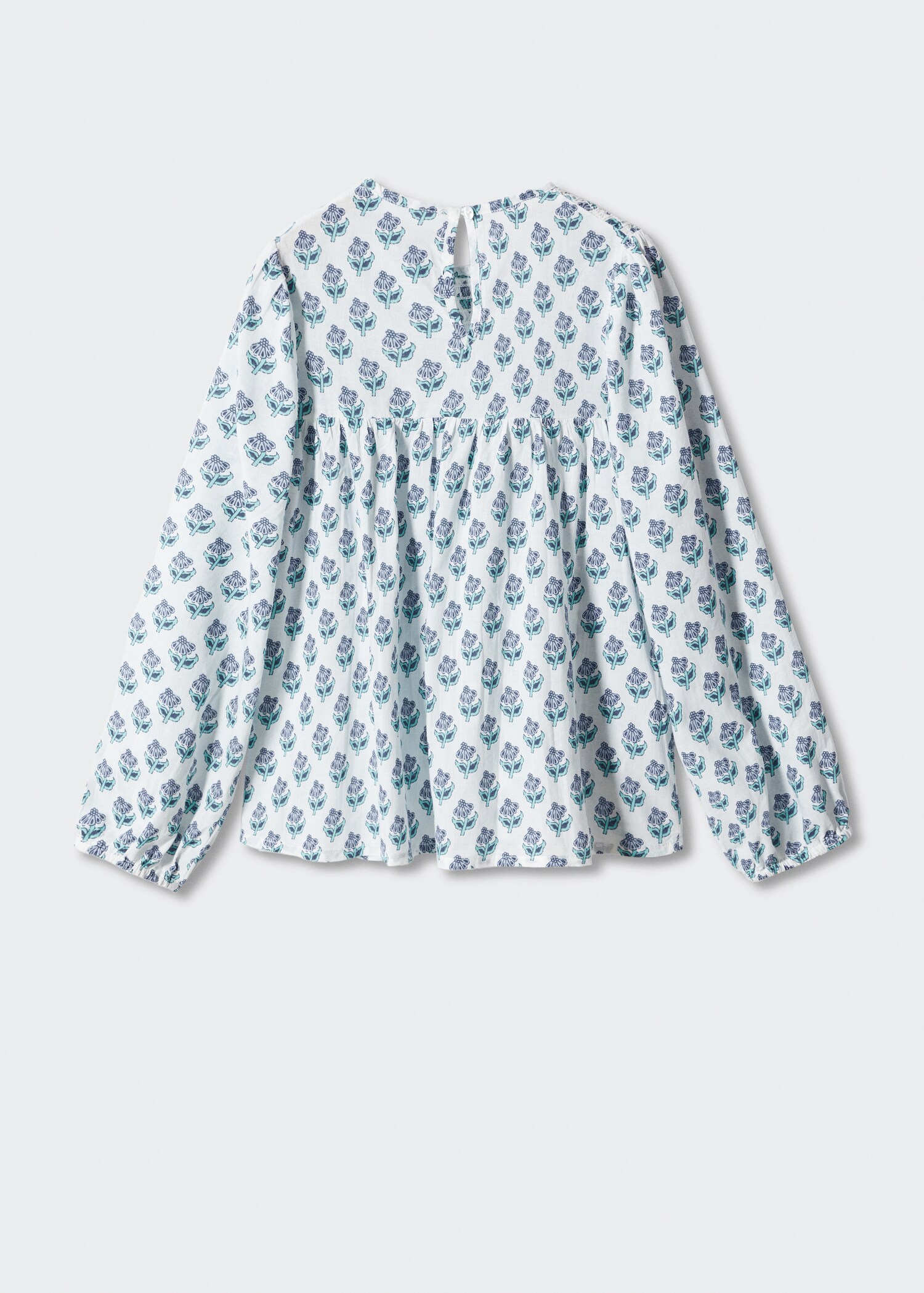 Bluse med blomstertrykk - Baksiden av artikkelen