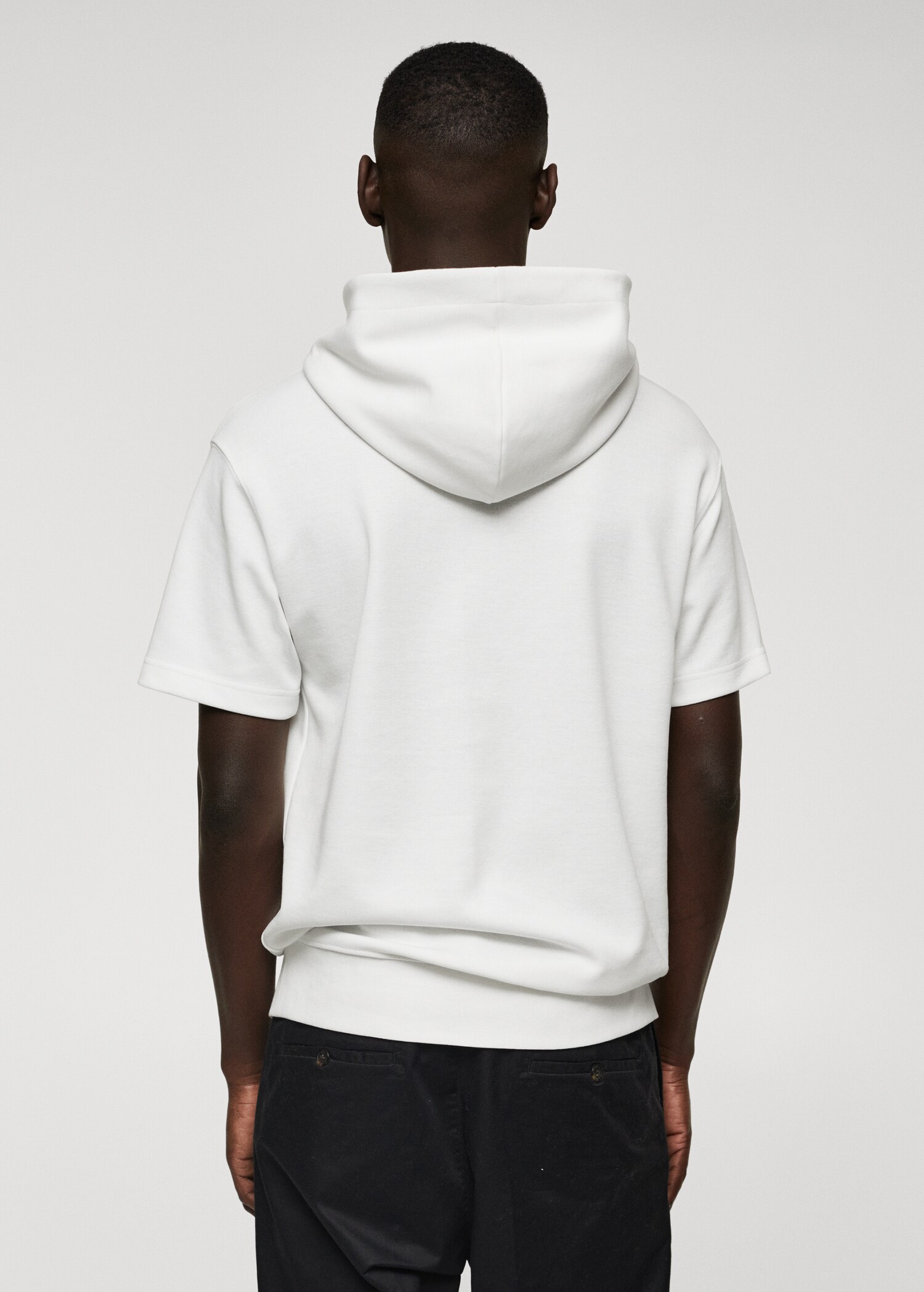 Short-sleeved hooded sweatshirt - Reverse of the article