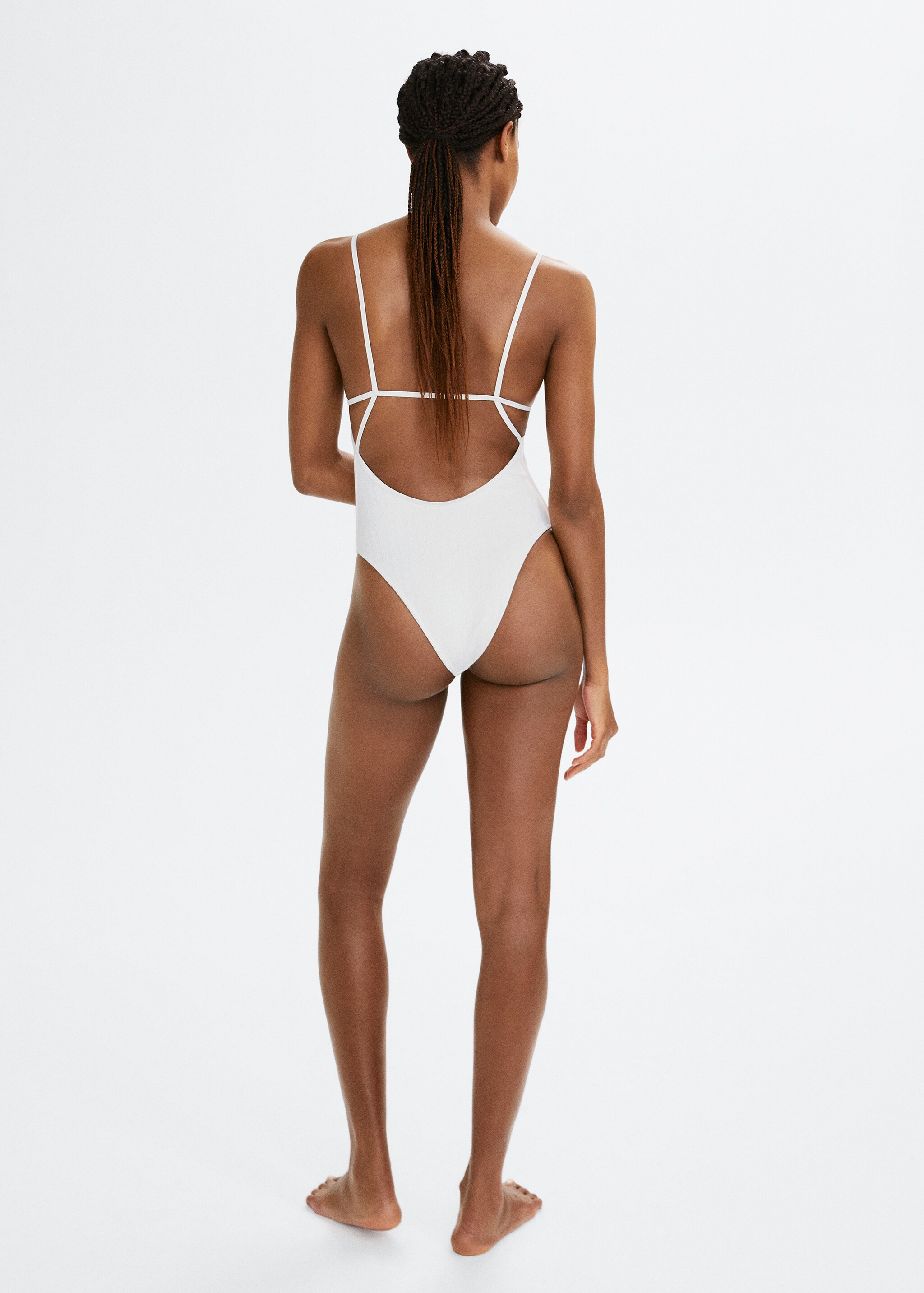 Striped textured swimsuit - Reverse of the article