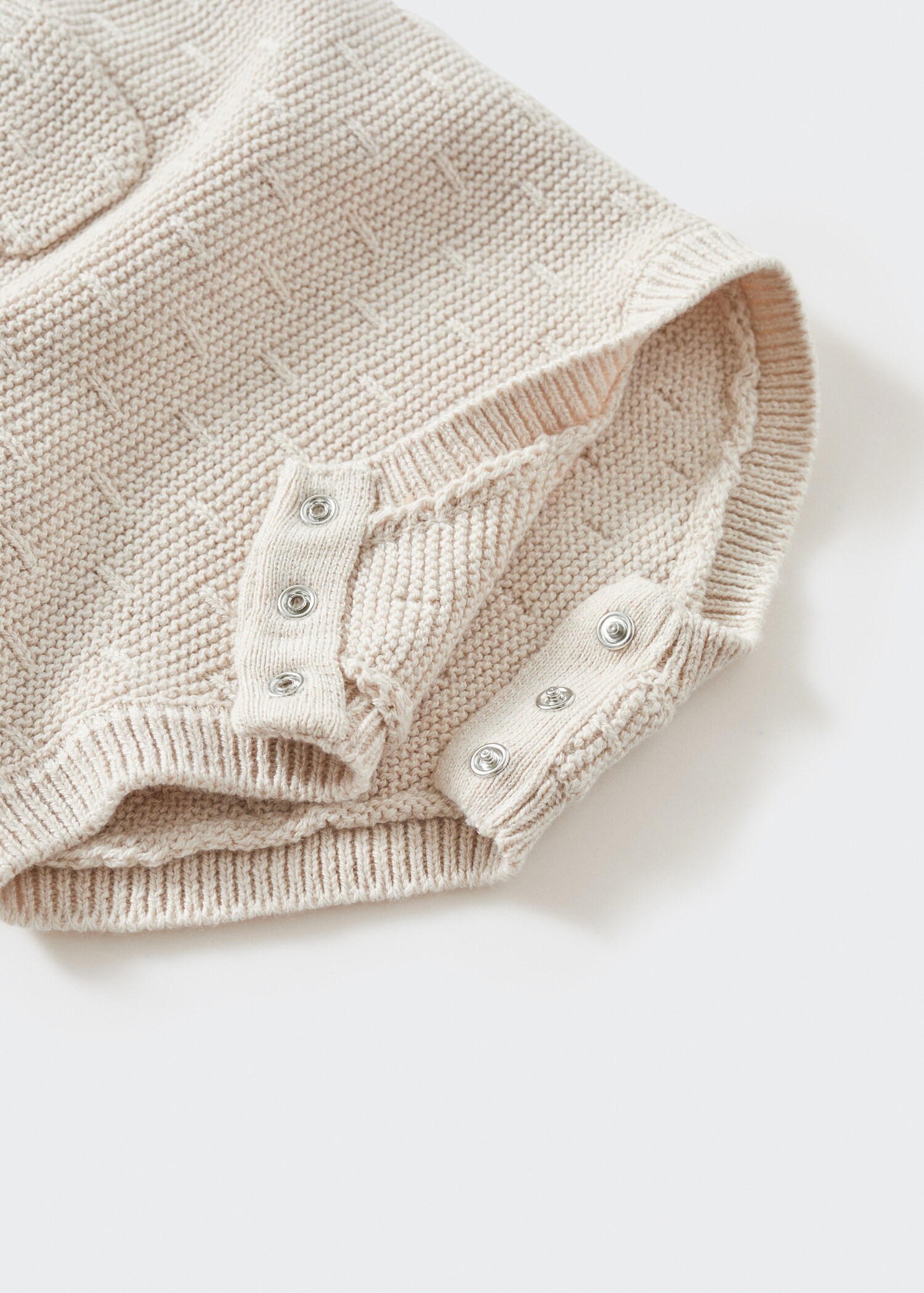 Strampler aus Strick - Detail des Artikels 0
