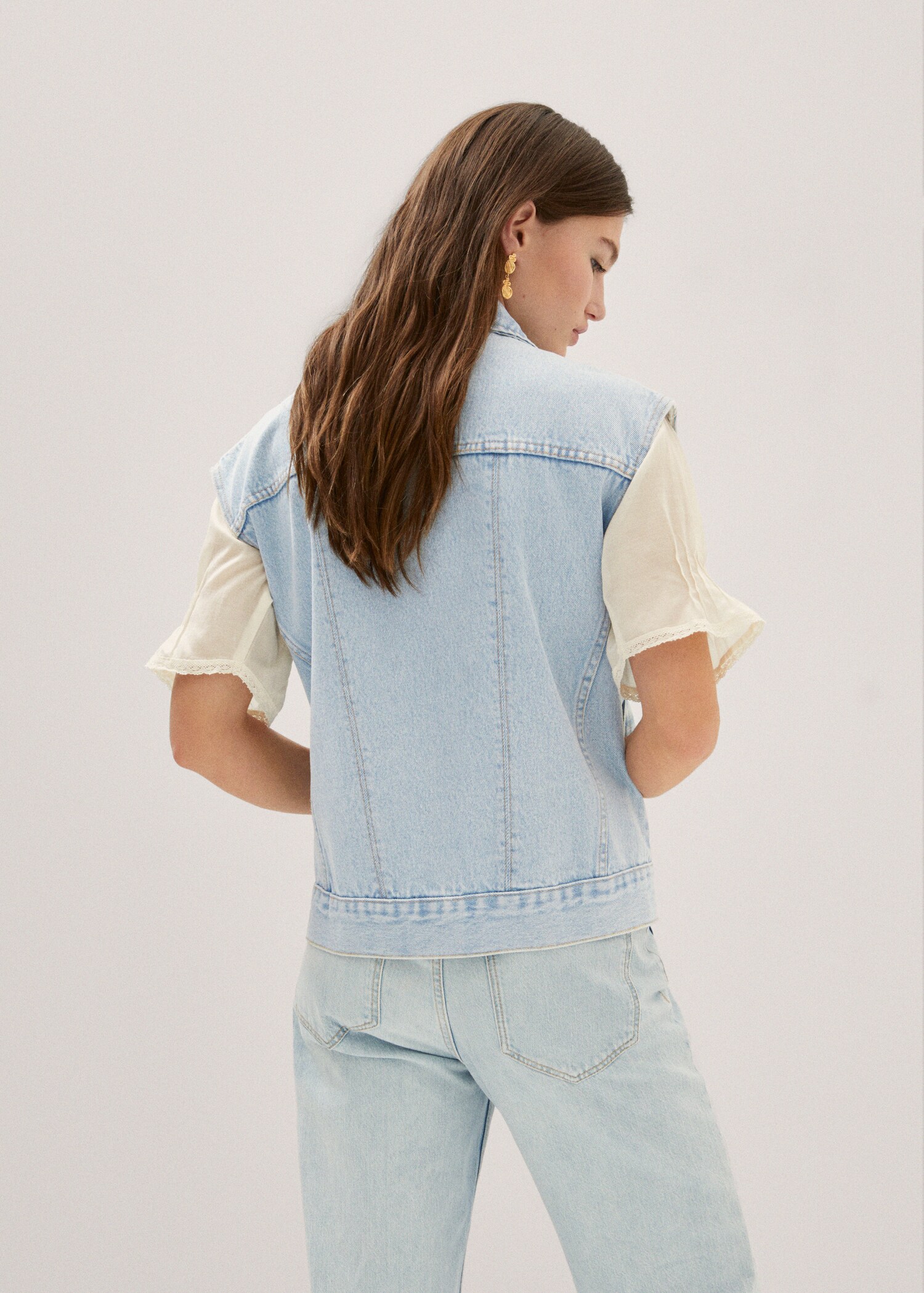 Denim vest with seams - Reverse of the article