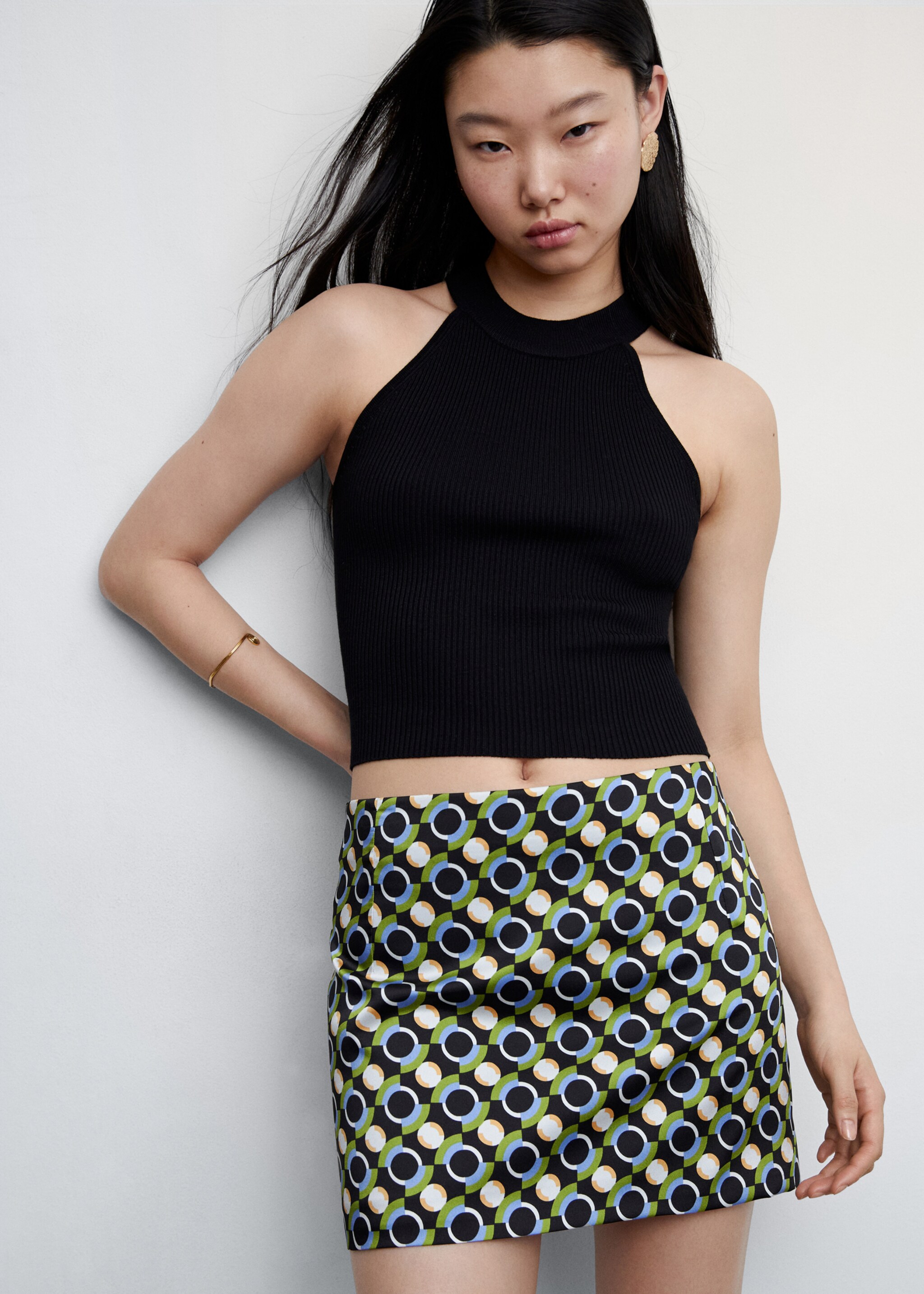 Printed miniskirt - Details of the article 1, Black. Ref: 47097139-00.
