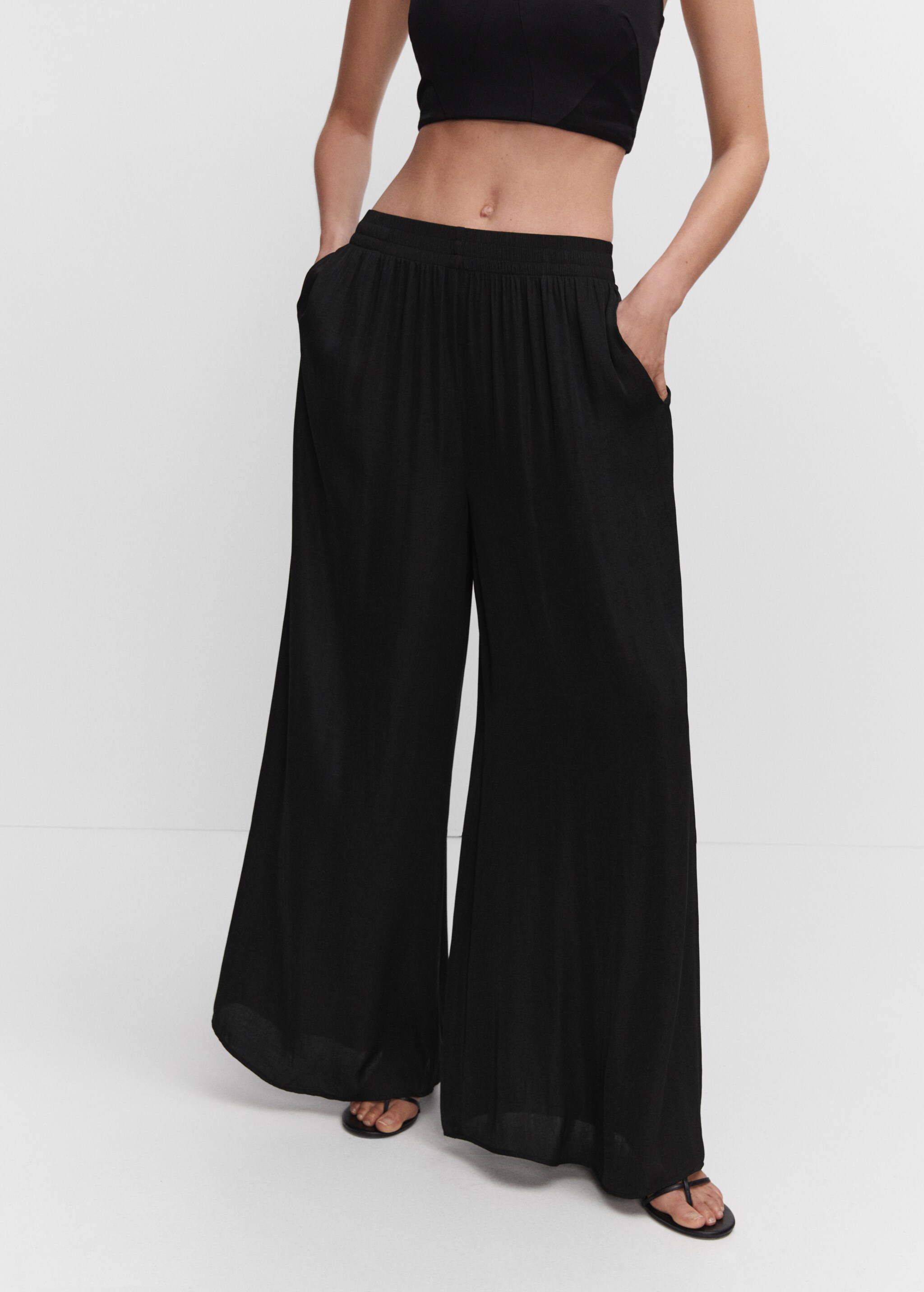 Low-rise palazzo trousers - Details of the article 6