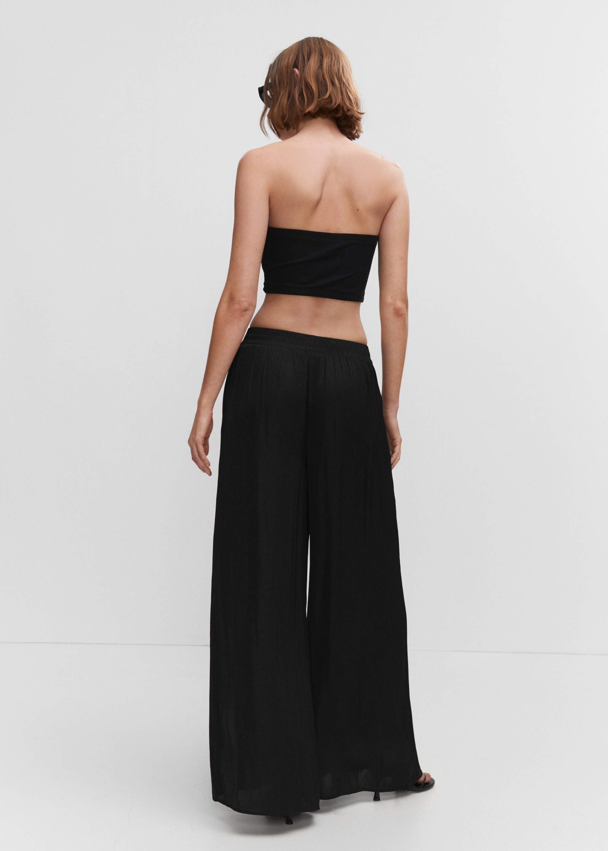 Low-rise palazzo trousers - Reverse of the article
