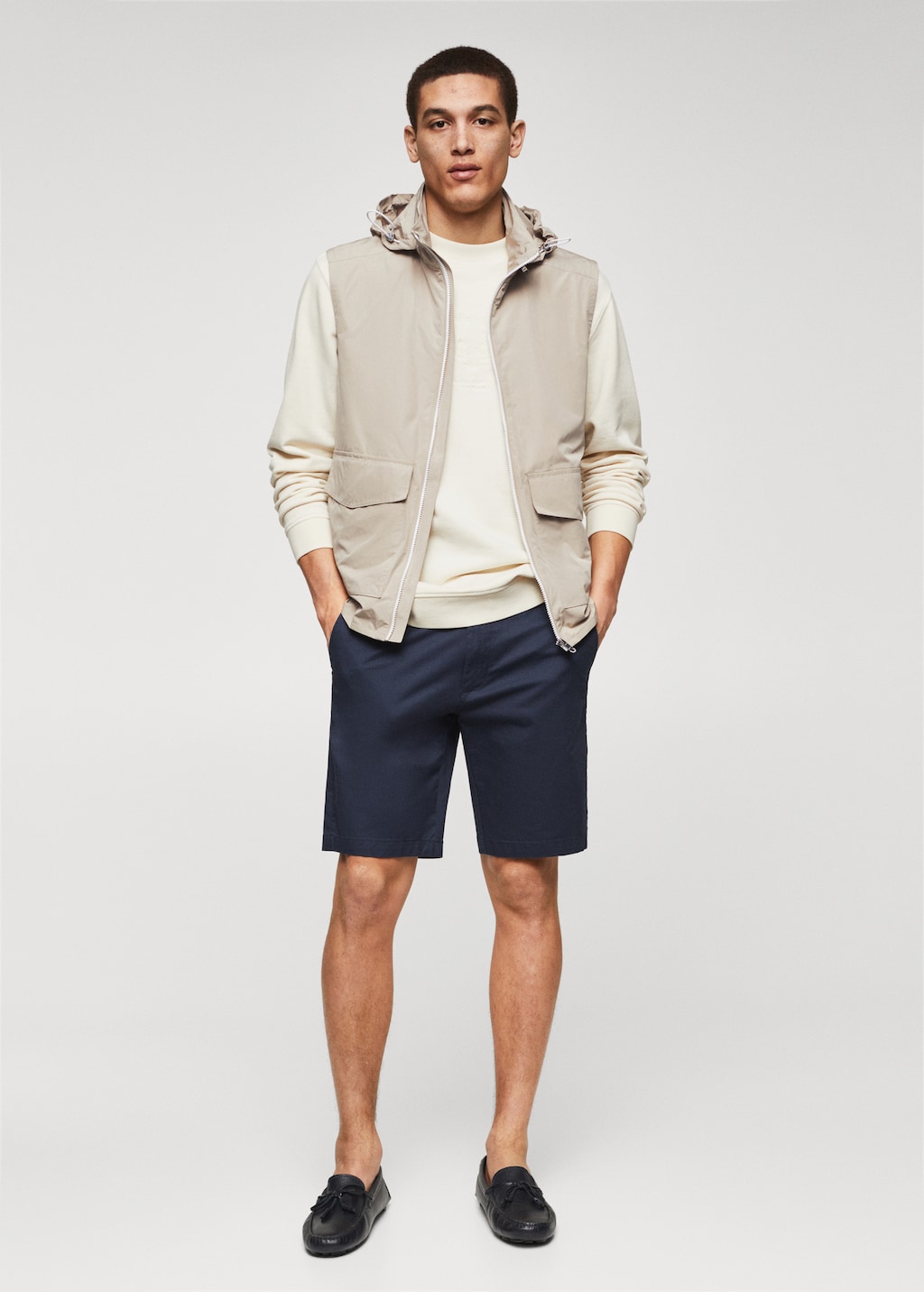 Water-repellent vest with hood