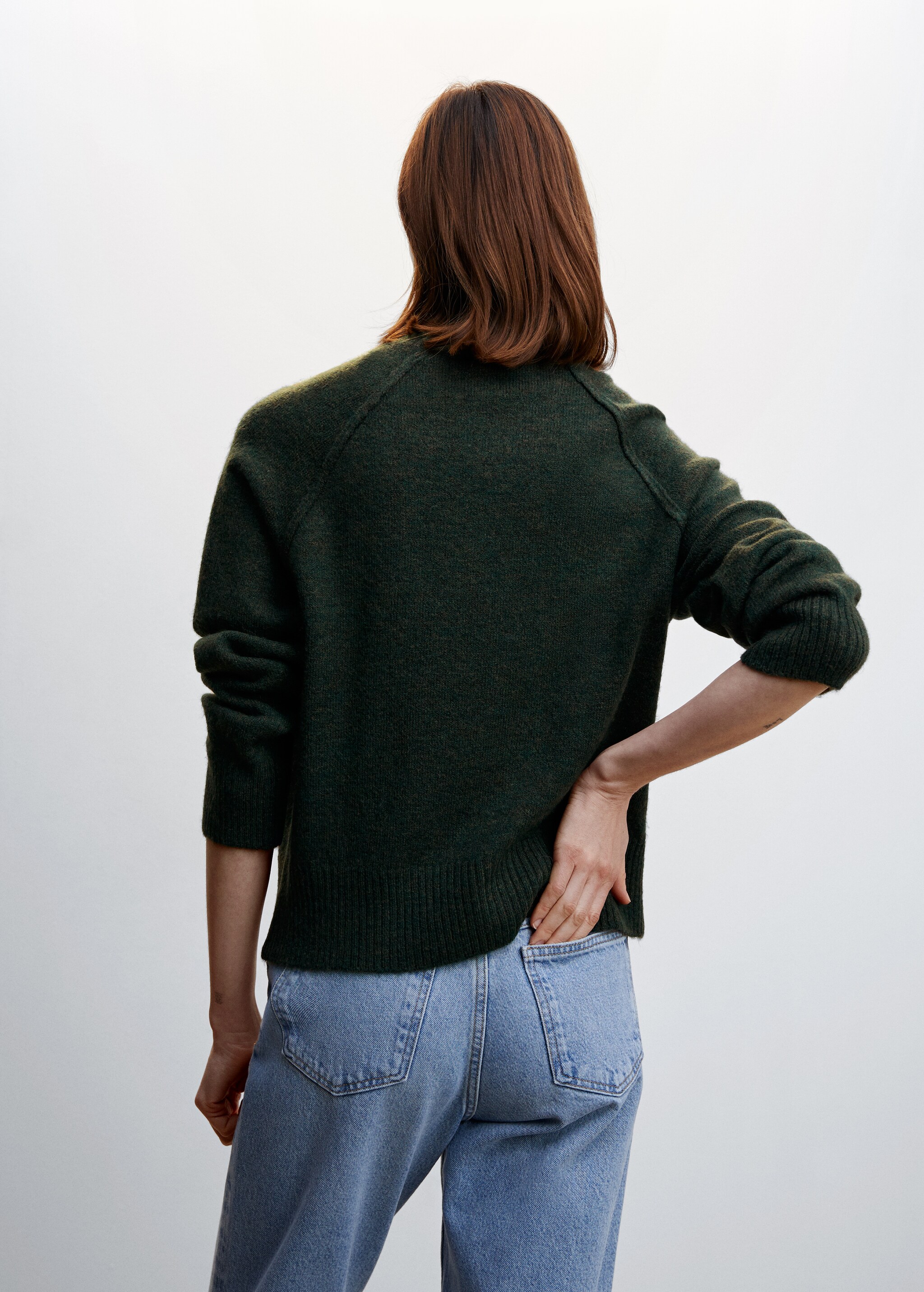 Turtleneck sweater with seams - Reverse of the article