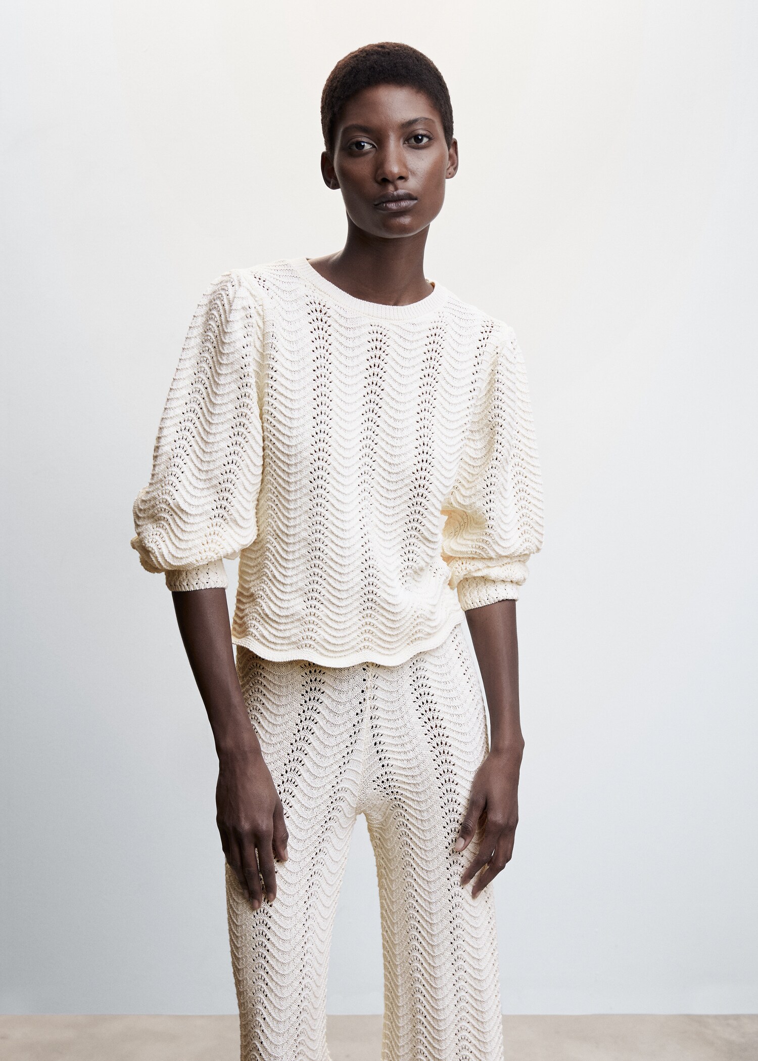 Puff-sleeve knitted sweater - Medium plane